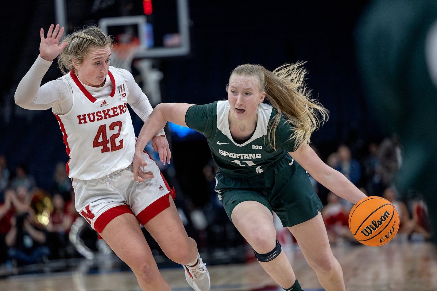 Michigan State's guard Matilda Ekh (11) drives the ball past Nebraska's guard Maddie Krull (42) during the third quarter of their game in the Big Ten women's basketball tournament on Thursday, March 2, 2023 at Target Center in Minneapolis, MN. ] Elizabeth Flores • liz.flores@startribune.com