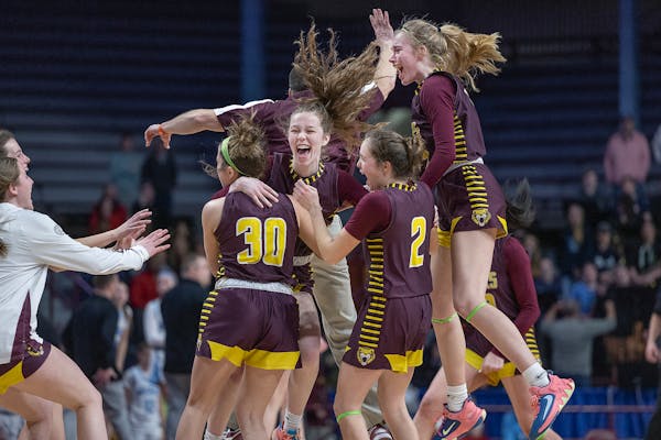 Stewartville players celebrate their 60-59 victory over Becker at Williams Arena in Minneapolis, Minn., on Thursday, March 16, 2023. ] Elizabeth Flore