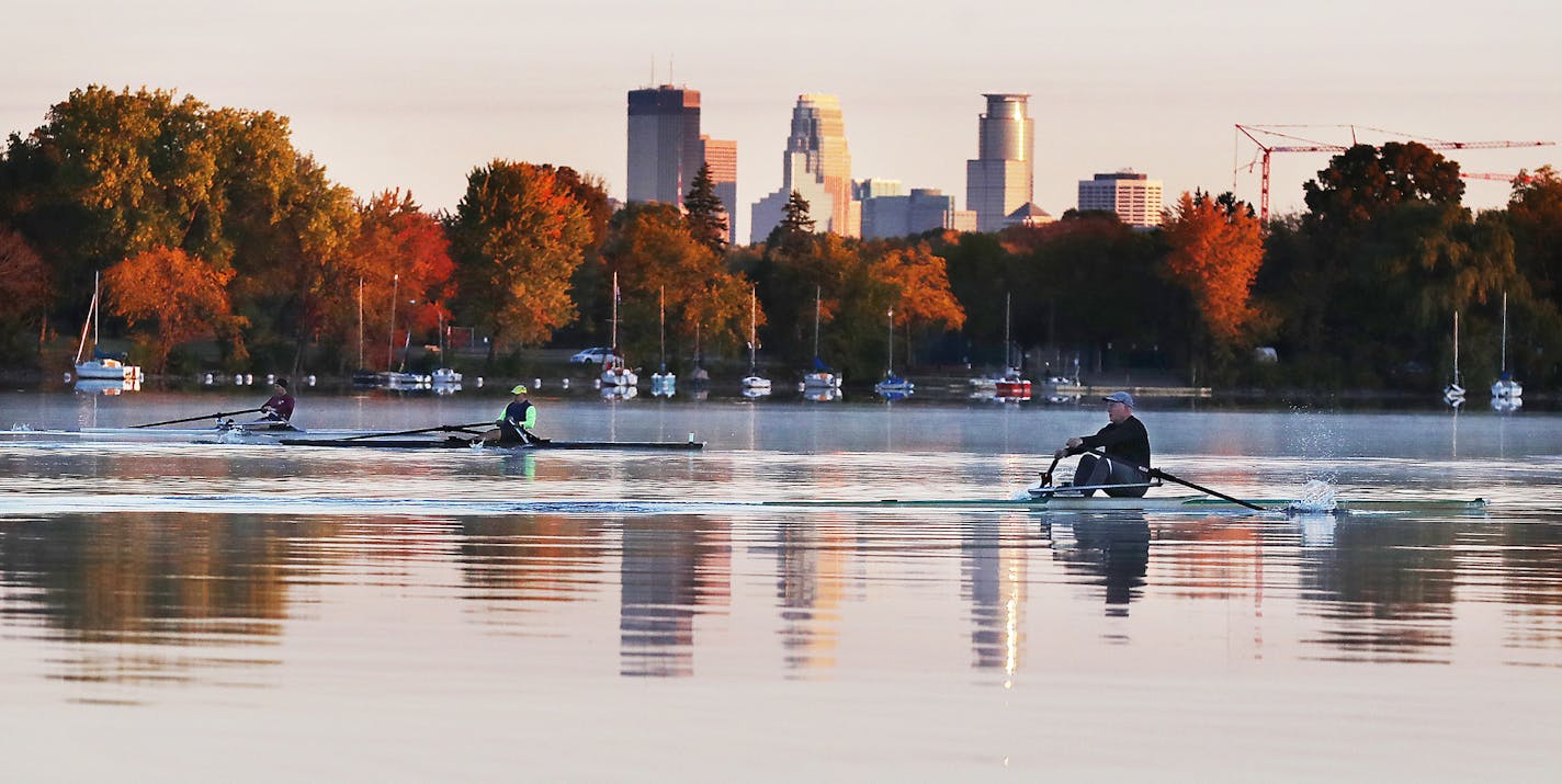 Trees were ablaze in fall colors and the Minneapolis skyline glowing at dawn as rowers in single sculls glided across a still Lake Nokomis Thursday in Minneapolis.] DAVID JOLES • david.joles@startribune.com Standalone feature photo Thursday, Oct. 8, 2020, in Minneapolis, MN Huge crowds have been gathering at the Mississippi River in downtown Minneapolis during a rare drawdown of the river below St. Anthony Falls as the U.S. Army Corps of Engineers uses the drawdown to inspect river structures. T