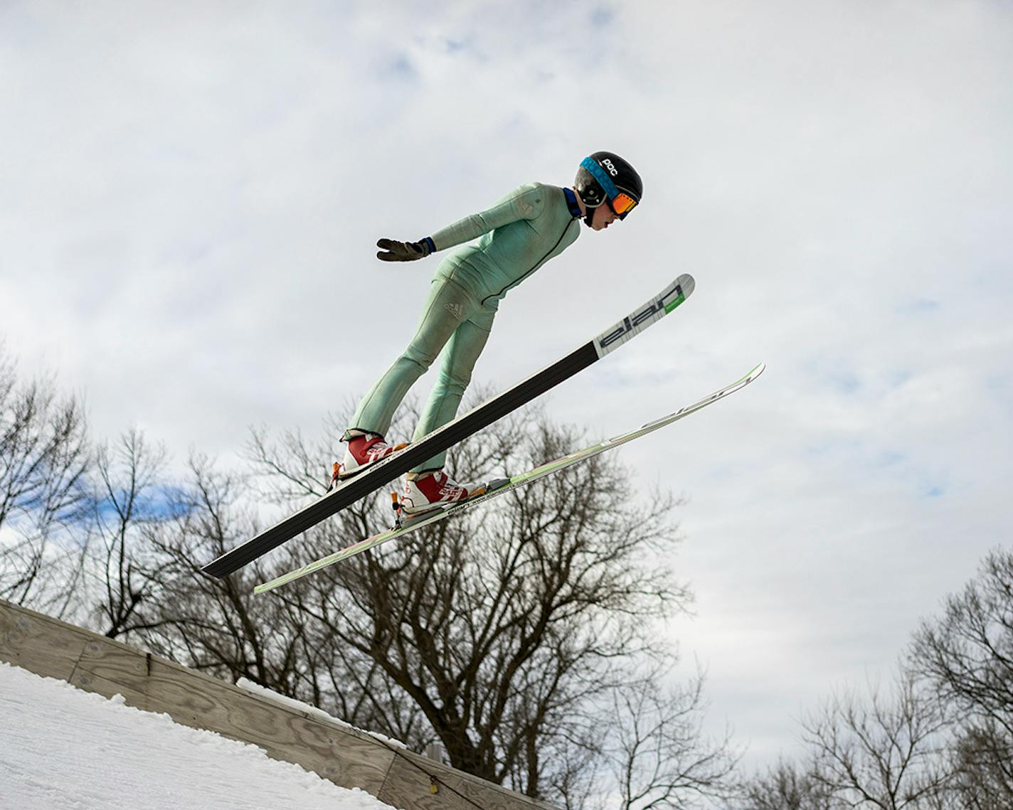 A ski jumper flying at the Norge ski jump at Fox River Grove, Ill.