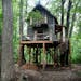 Magician Matt Dunn, whose home sits on 3 acres of wooded land in Plymouth, built a deluxe, two-story treehouse that serves as his man cave.