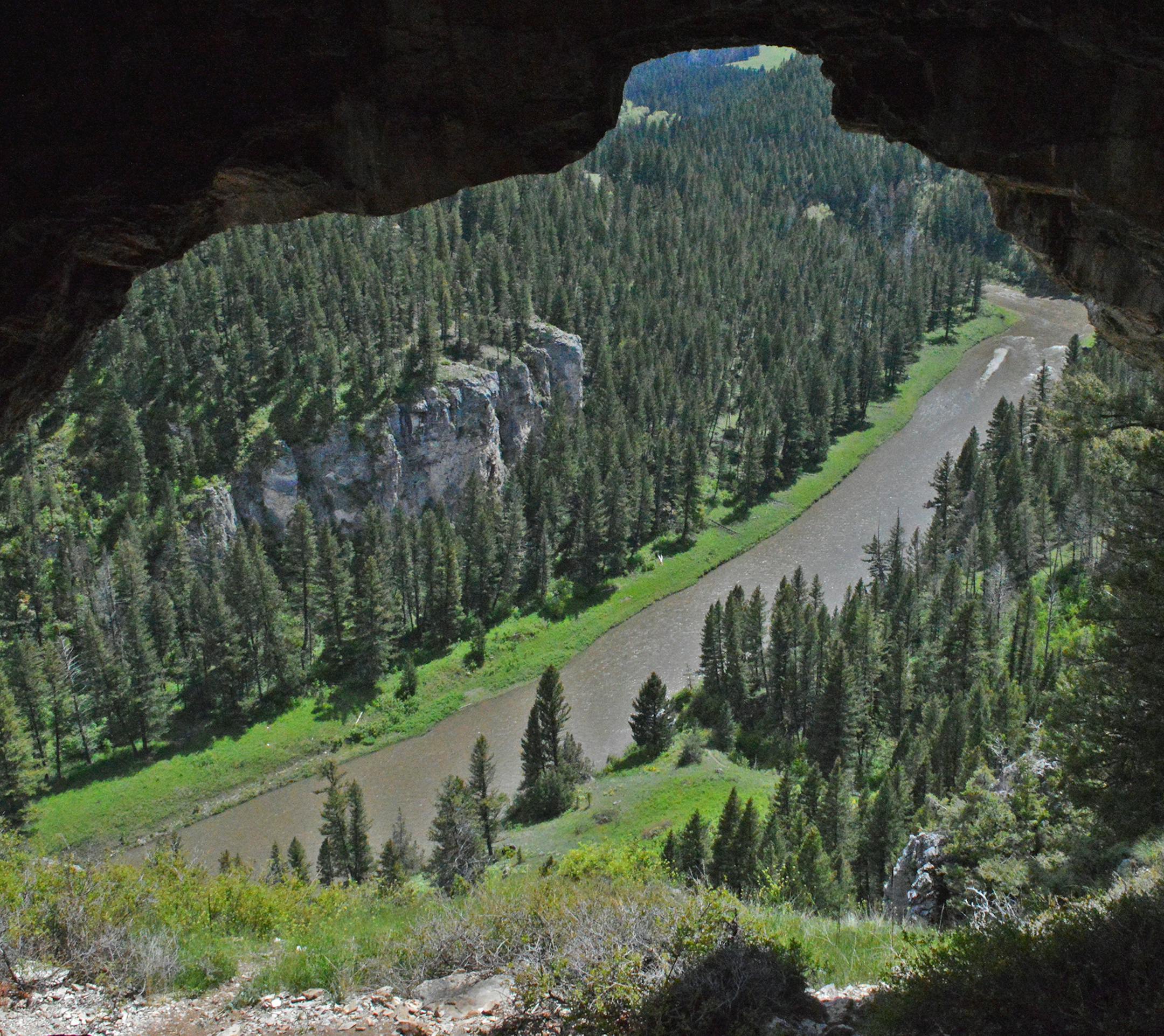 Caves used by Native Americans thousands of years ago overlook Montana's Smith River as it flows through steep limestone bluffs.