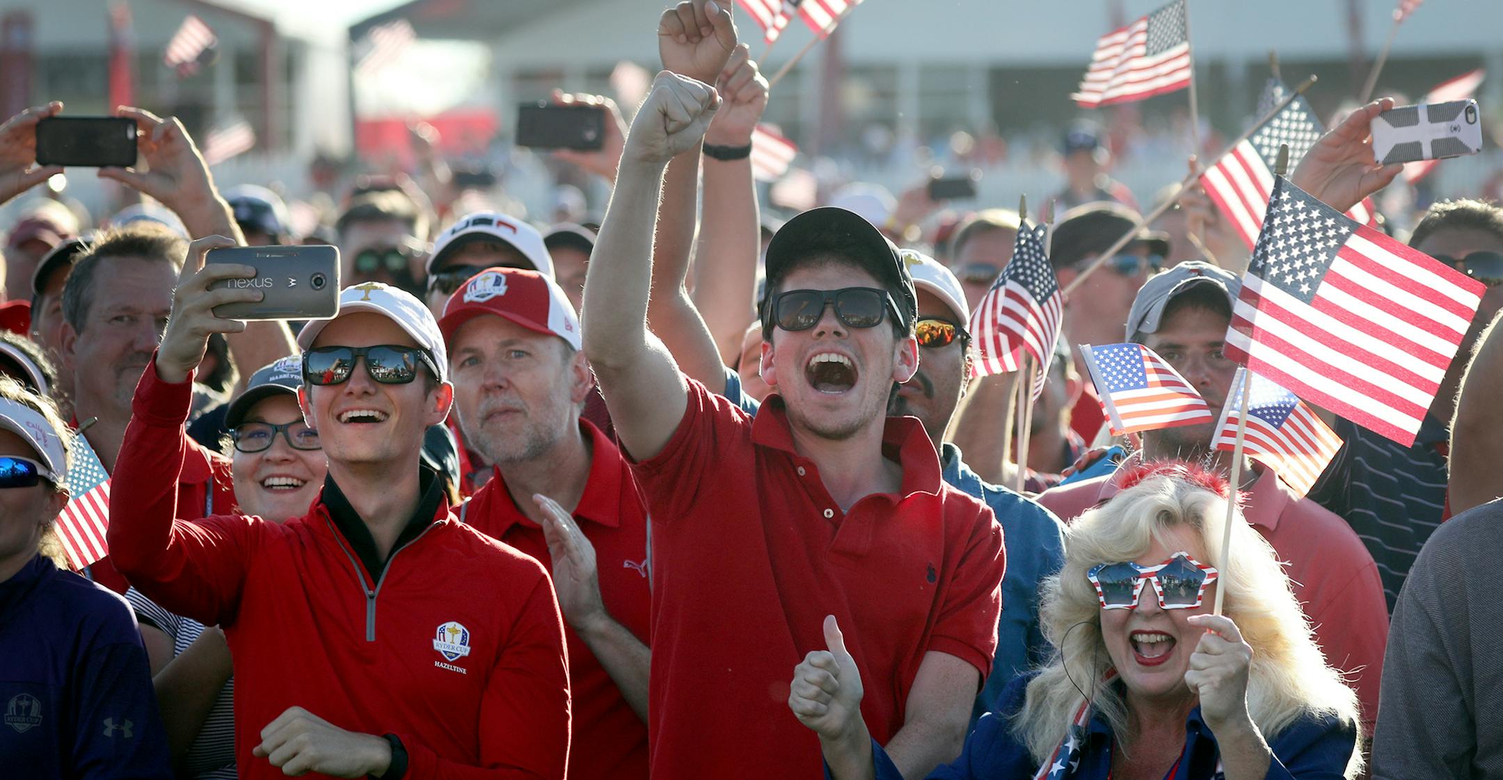 USA fans cheer during the Ryder Cup ceremony. ] (Leila Navidi/Star Tribune) leila.navidi@startribune.com BACKGROUND INFORMATION: The Ryder Cup was held on Sunday, October 2, 2016 at Hazeltine National Golf Club in Chaska, Minn.