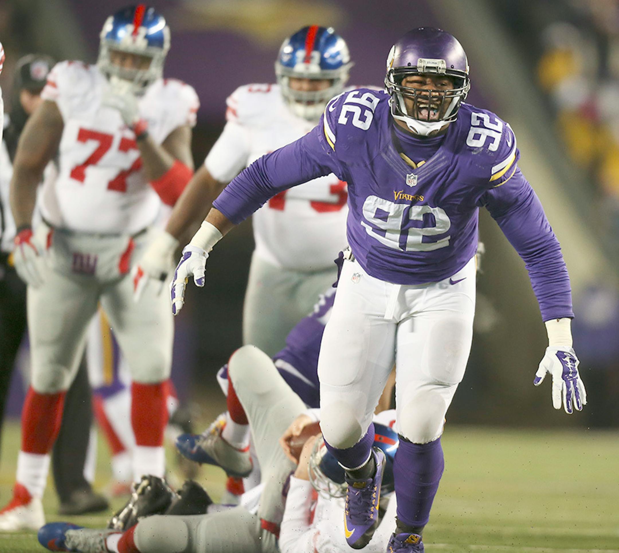 Vikings defensive tackle Tom Johnson (92) celebrated his sack of Giants quarterback Eli Manning (10) for an eight yard loss by in the second quarter Sunday night. The Giants' Ereck Flowers was penalized on the play for unnecessary roughness on the play.