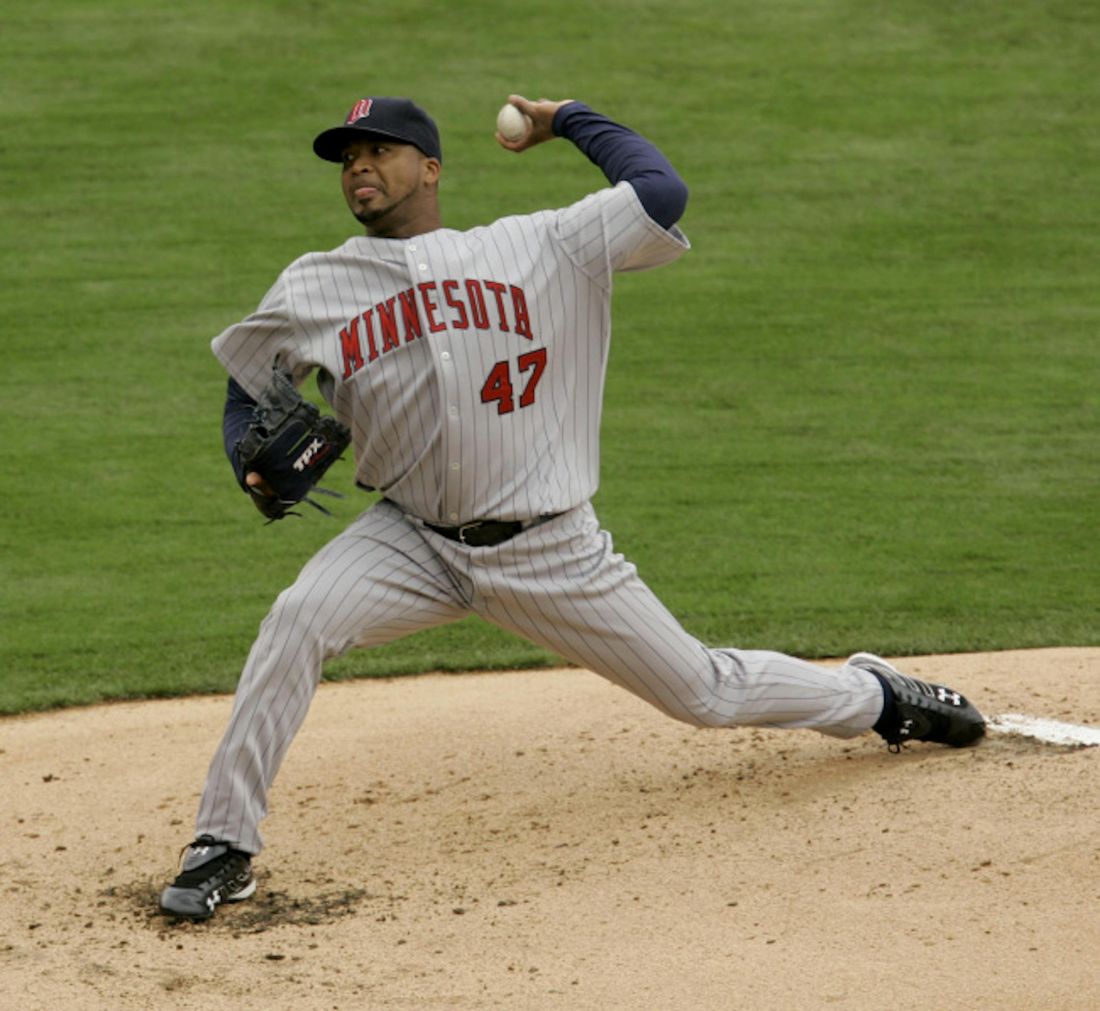 Minnesota Twins starter Francisco Liriano delivers during the first inning of a baseball game against the Kansas City Royals on Sunday, April 13, 2008, in Kansas City, Mo.