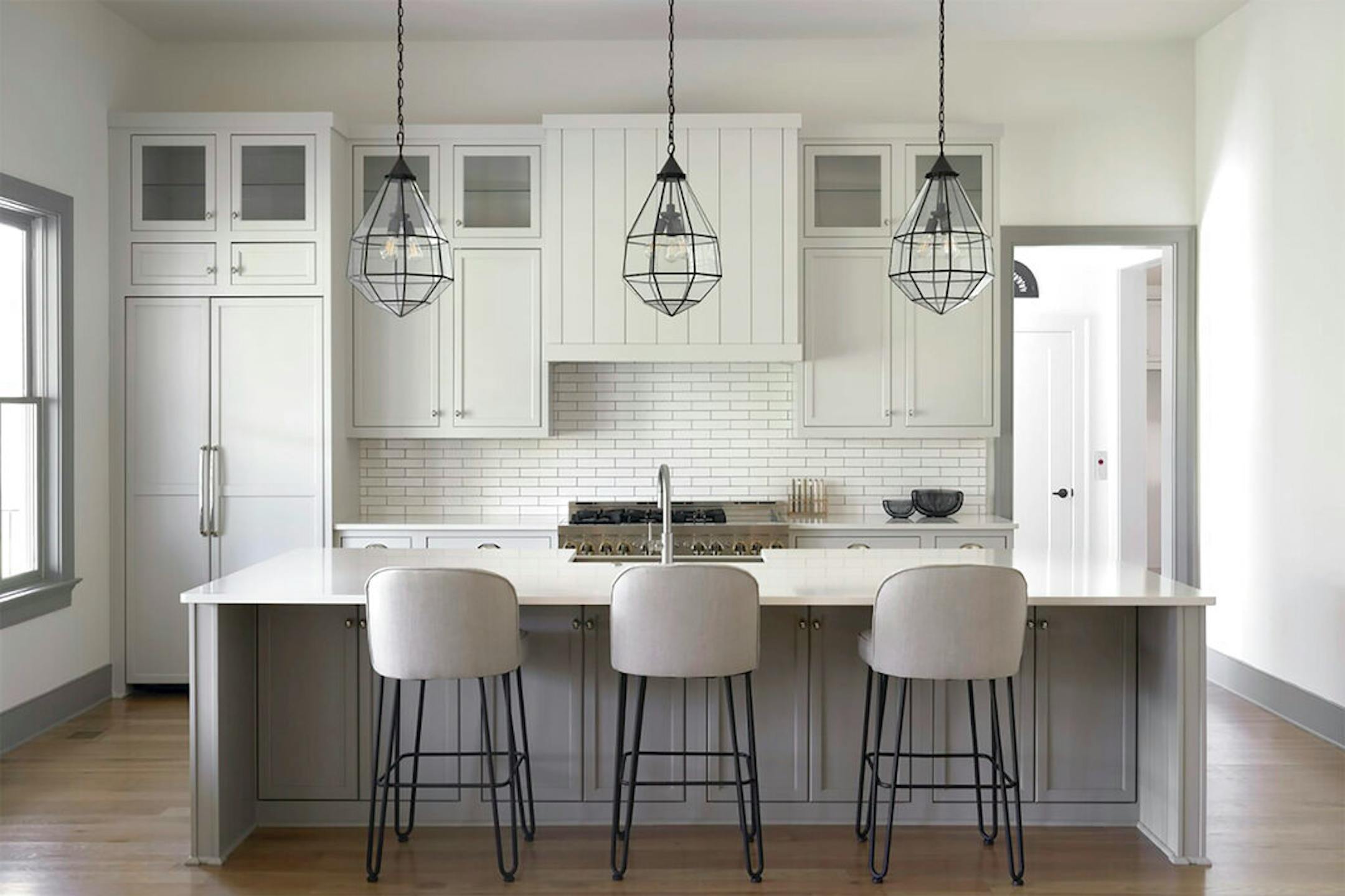 This image provided by Nicholas McGinn, Jr.shows an open planned kitchen. Amhad Freeman, founder of the Nashville, Tennessee-based Amhad Freeman Interiors, says clients now have time to really think about what they need from a room. People are also cooking more than ever before and many of his clients are using money they're not spending on travel and restaurant meals to invest in serious kitchen renovations. (Nicholas McGinn, Jr. via AP)