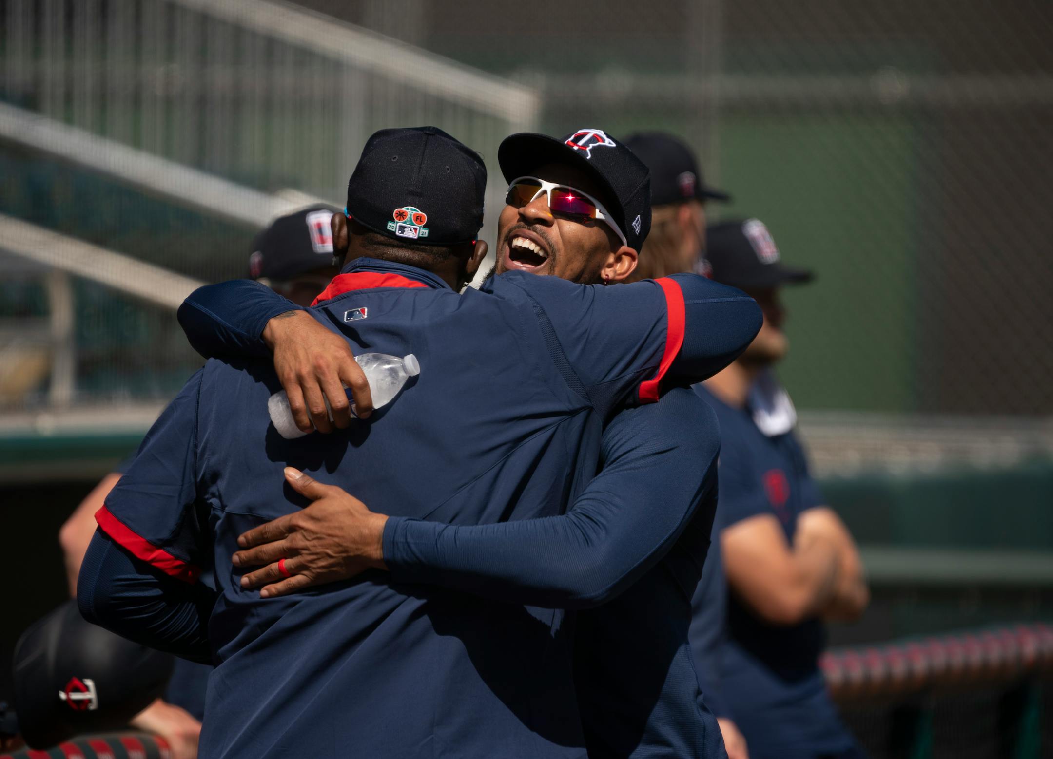 Minnesota Twins center fielder Byron Buxton embraced first baseman Miguel Sano as practice was underway Tuesday morning.