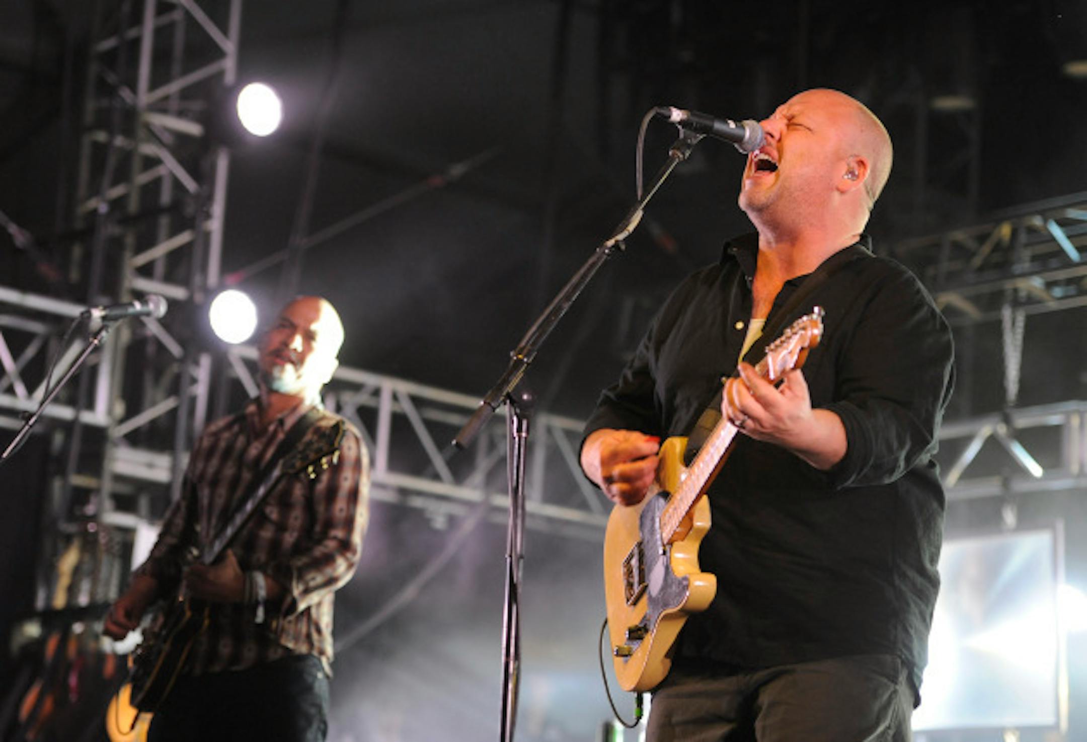 The Pixies' Frank Black, right, and Joey Santiago at Coachella in 2014. / Photo by Chris Pizzello, Invision/AP