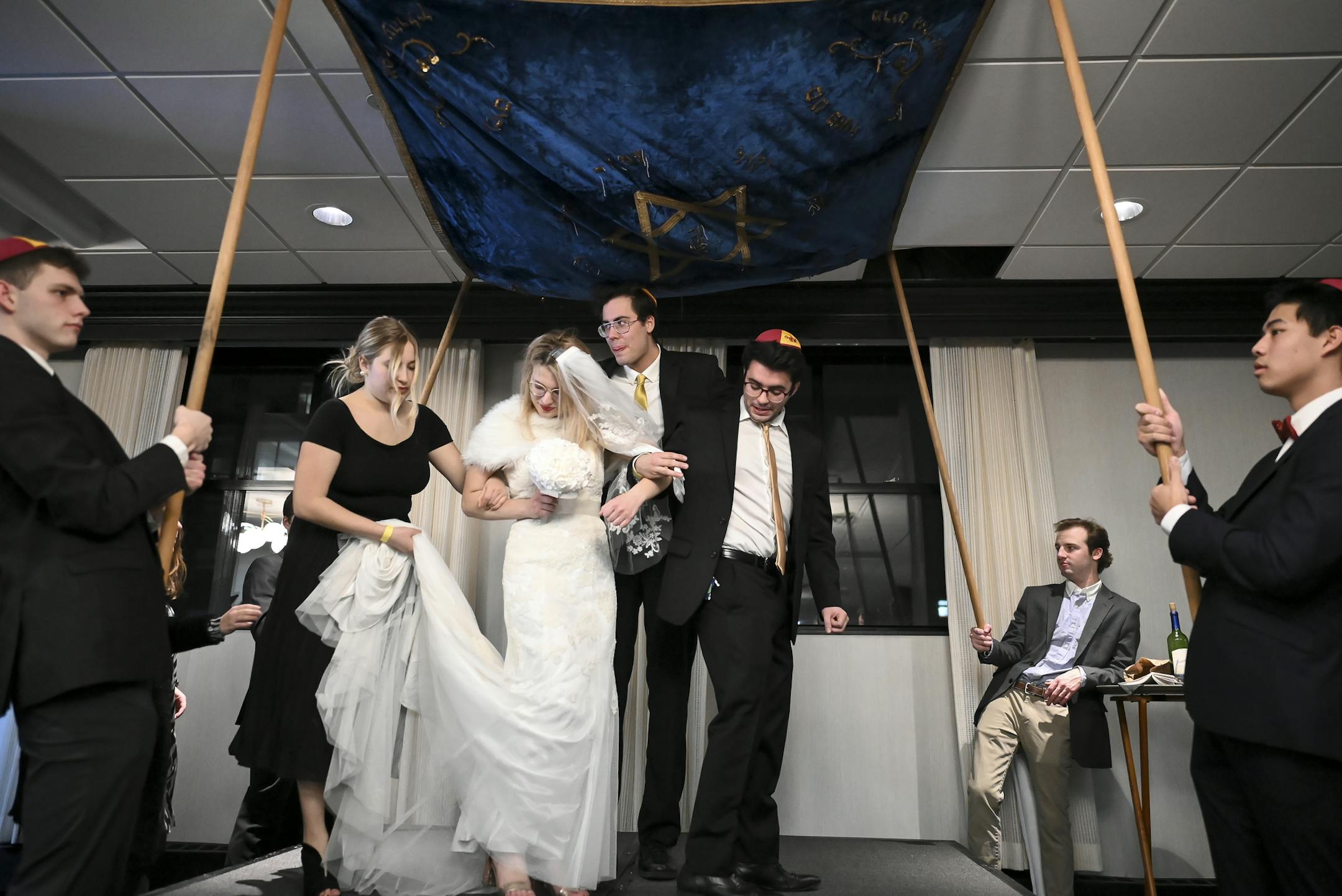 Fake bride Gabriella Sonnenscheim walked around her fake groom, Caleb Mesick, seven times after she arrived under the chuppah during the start of their fake wedding ceremony Thursday night. ] Aaron Lavinsky • aaron.lavinsky@startribune.com Every year Chabad at the University of Minnesota puts on a fake wedding to showcase what a Jewish wedding is like. We photograph the fake wedding on Thursday, Feb. 6, 2020 at the Graduate Minneapolis Hotel in Minneapolis, Minn.