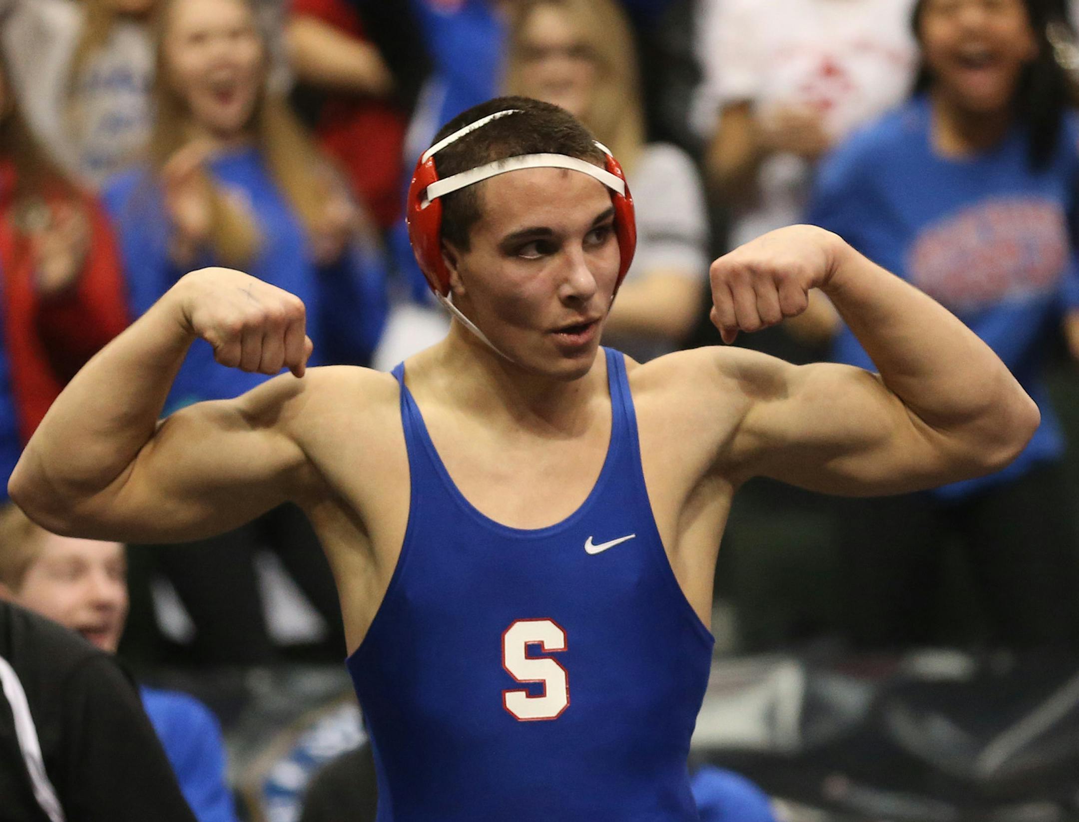 Simley's Chris Bauman celebrated beating Scott West's Ray Carter in the 195 weight class. ] (KYNDELL HARKNESS/STAR TRIBUNE) kyndell.harkness@startribune.com - 2A team State wrestling tournament at the Xcel Energy Center in St. Paul Thursday, February 27, 2014.