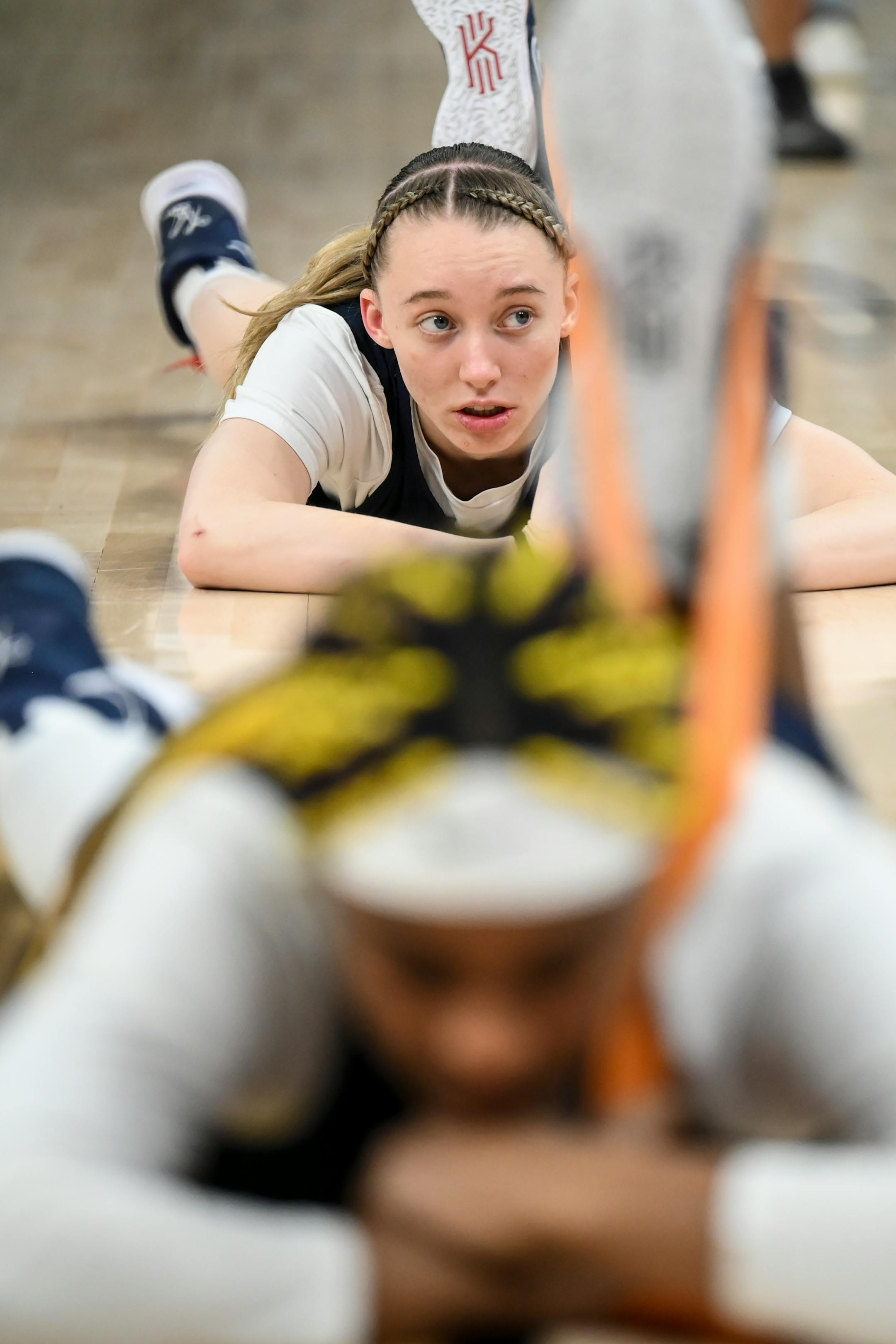 UConn guard Paige Bueckers (5) looks on as she stretches during a Final Four open practice held Saturday, April 2, 2022 at Target Center in Minneapolis, Minn.m