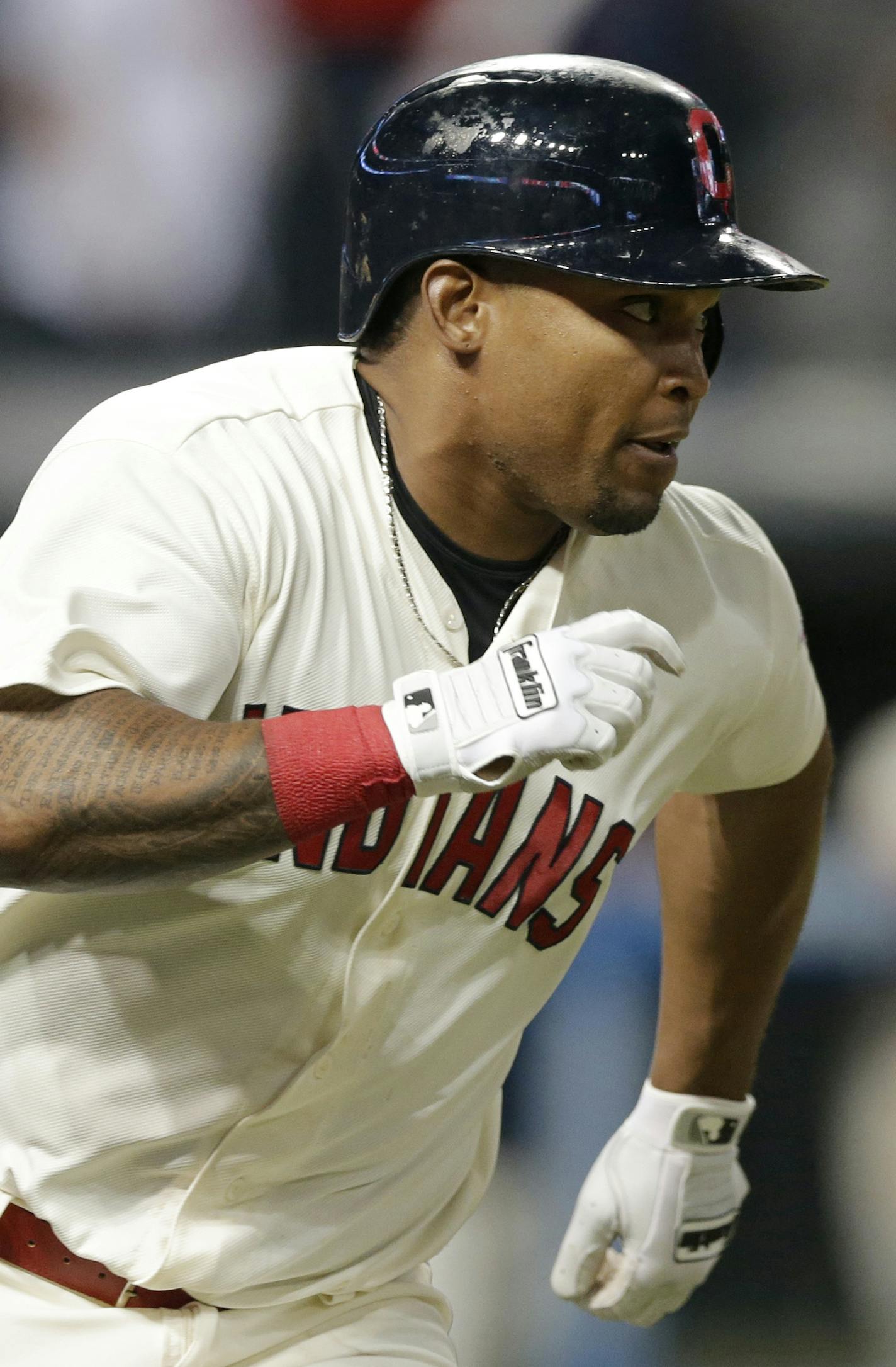 Cleveland Indians' Marlon Byrd watches his two-run double off Minnesota Twins relief pitcher Trevor May during the eighth inning of a baseball game Friday, May 13, 2016, in Cleveland. The Indians won 7-6. (AP Photo/Tony Dejak)