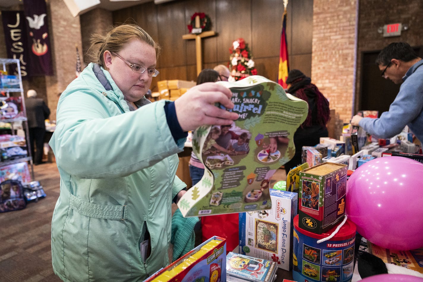 Lauren Mathisen of Bloomington picked out toys for her four children.