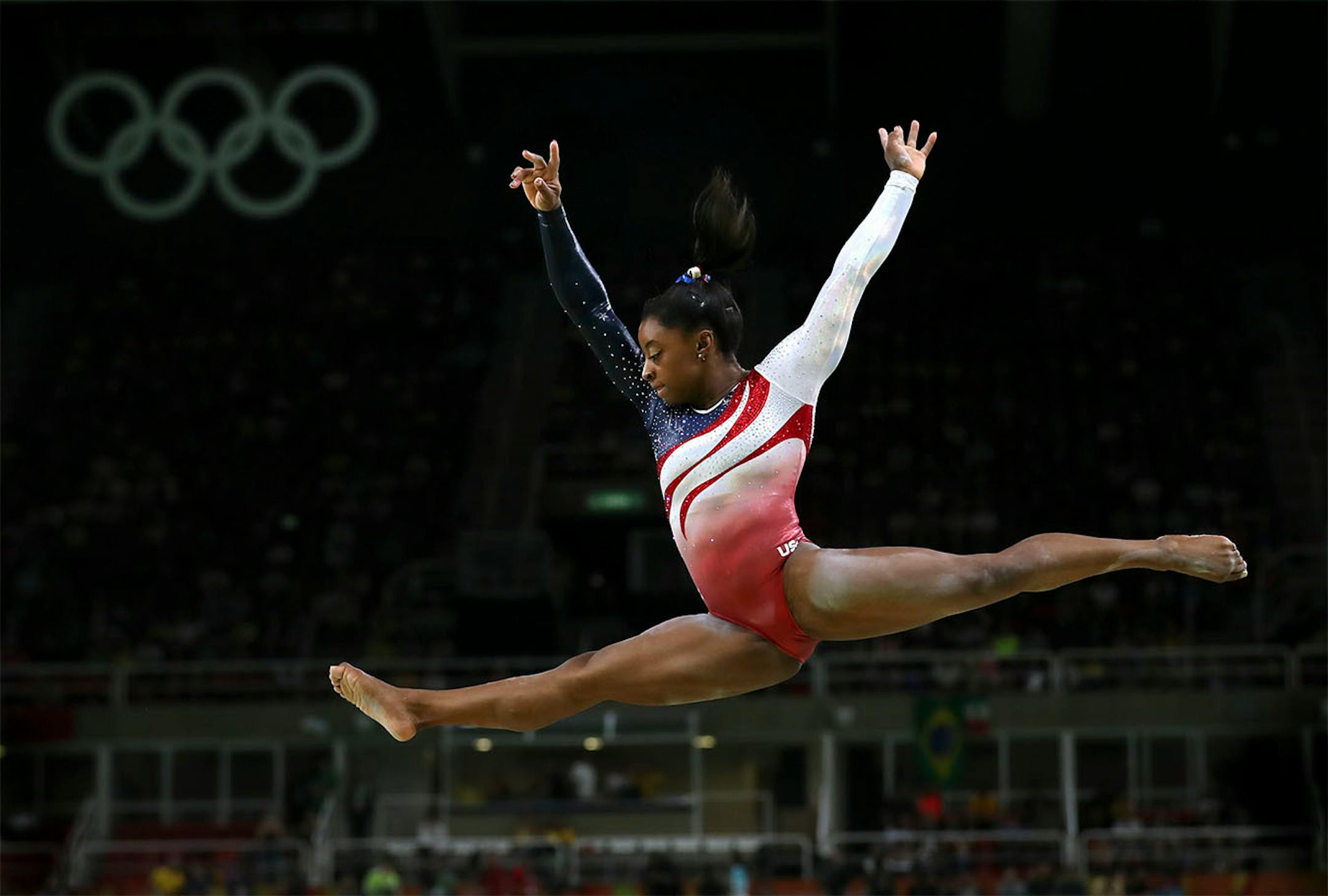 USA women's Gymnastic team took home the gold medal in team competition for the 2nd straight Olympics. Here, Simone Biles competes on the beam during the competition.