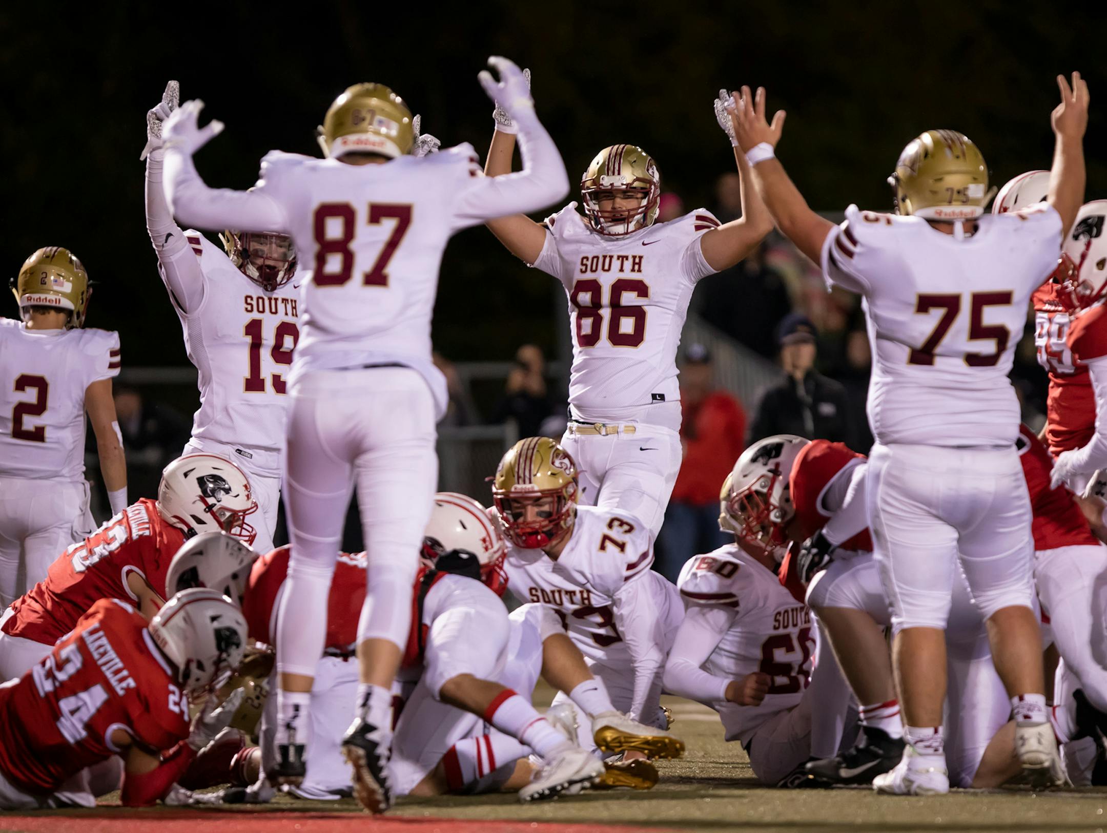 ***99% sure it is #22, this is the 2nd to last touchdown for LS.***** Celebrating a Lakeville South RB Riley Haglund (22) touchdown. [ Special to Star Tribune, photo by Matt Blewett, Matte B Photography, matt@mattebphoto.com, October 3, 2019, Lakeville North High School, Lakeville, Minnesota, SAXO 1009672801 PREP.lake