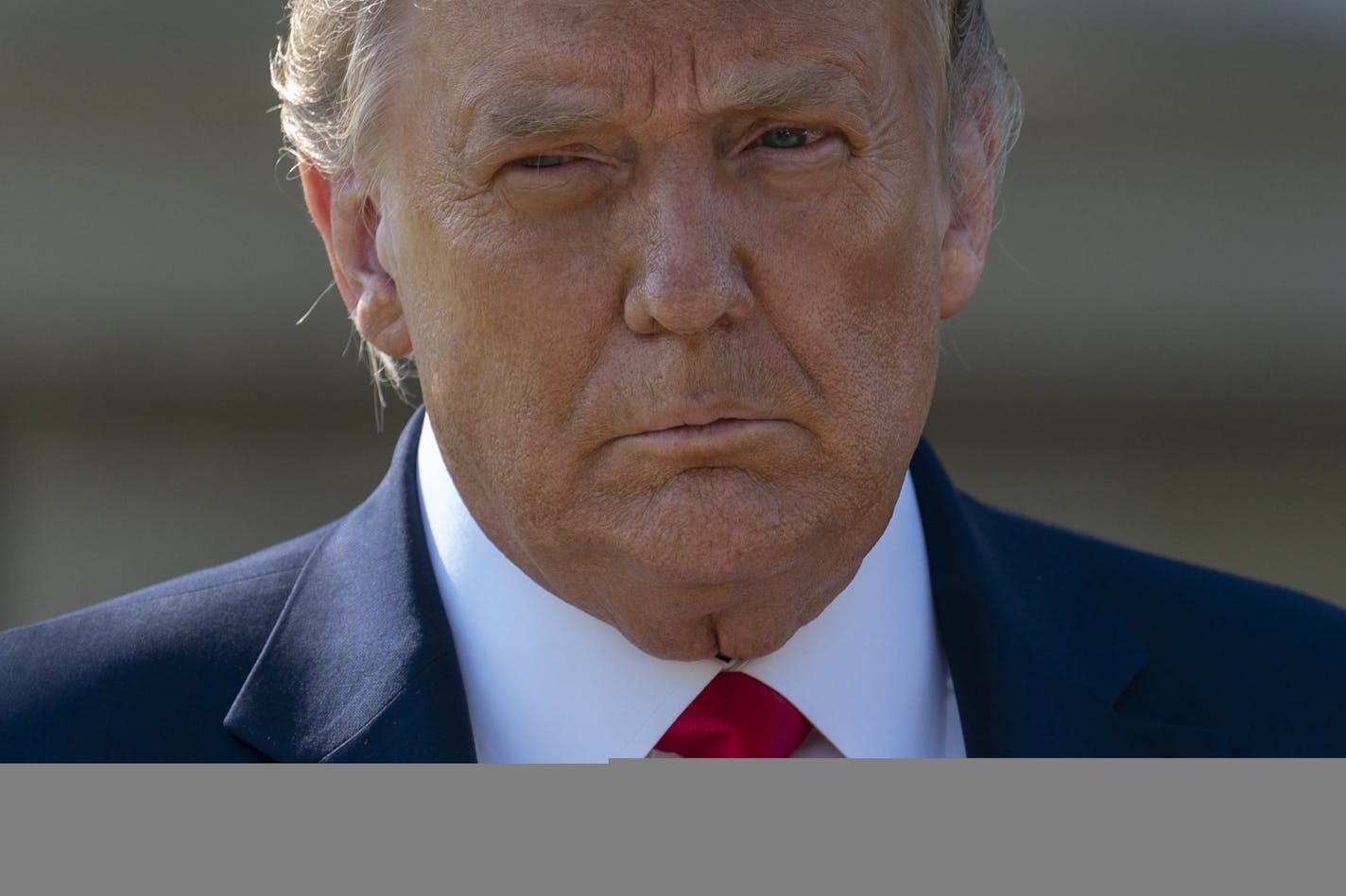 President Donald Trump walks to speak to media before boarding Marine One at the White House, Wednesday, Sept. 30, 2020, in Washington, for the short trip to Andrews Air Force Base en route to Minnesota. (AP Photo/Carolyn Kaster)