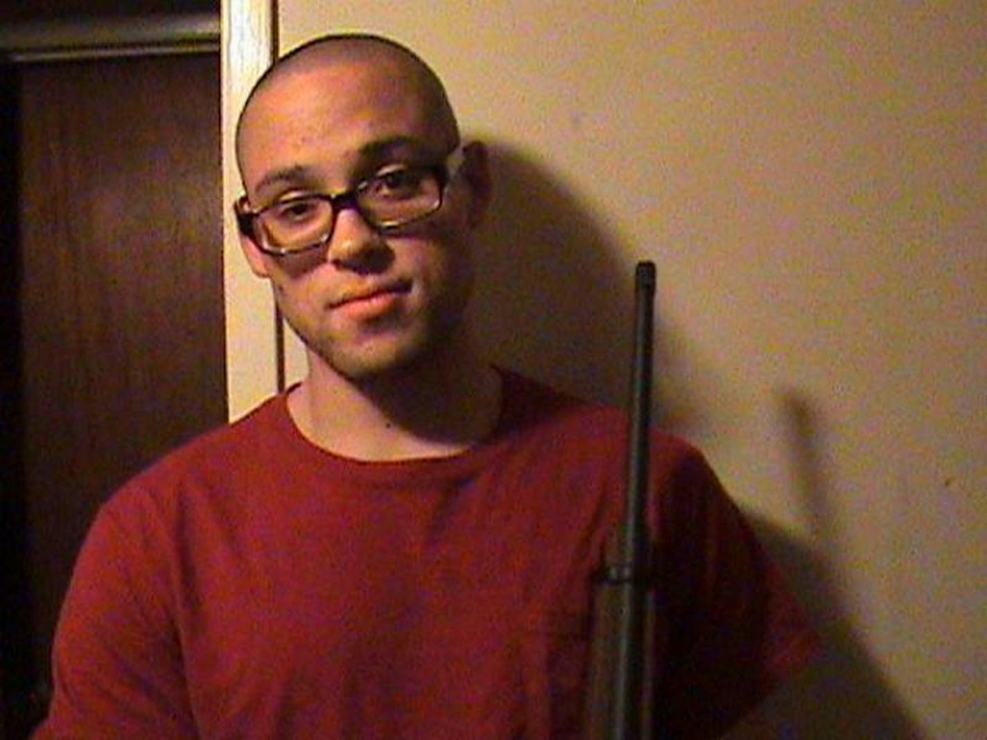 Christopher Harper-Mercer is shown on a MySpace page holding a rifle.