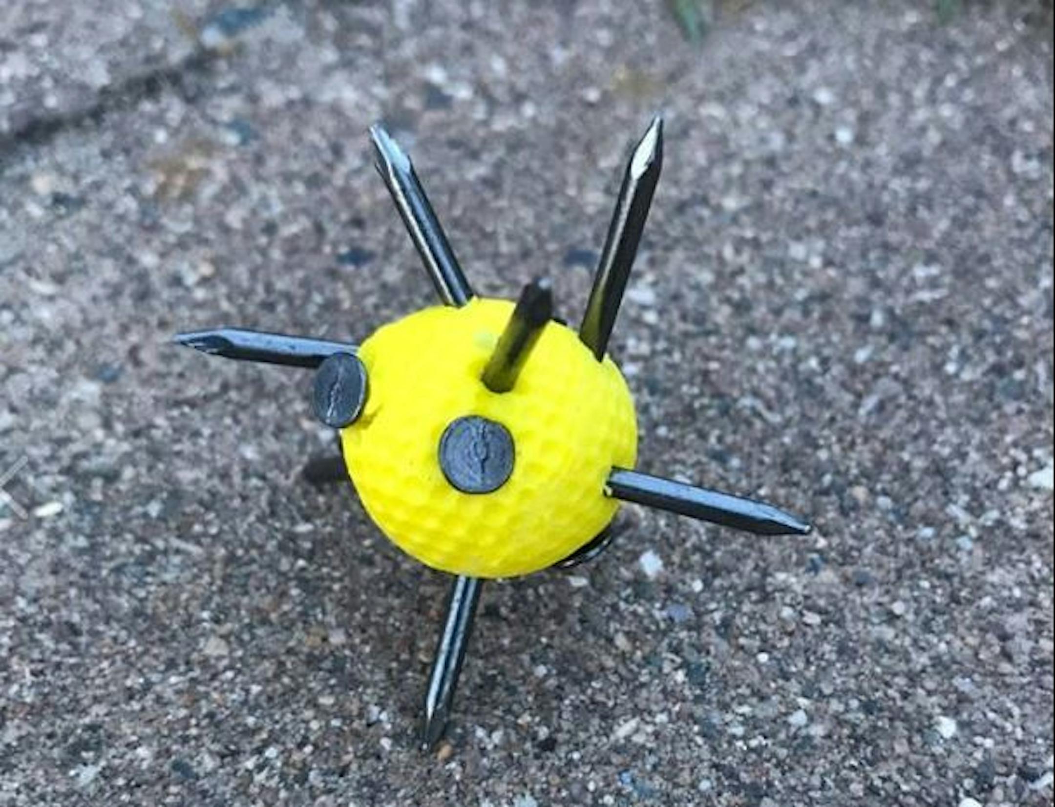 This golf ball with nails protruding from it was found in Antler Park in Lakeville.