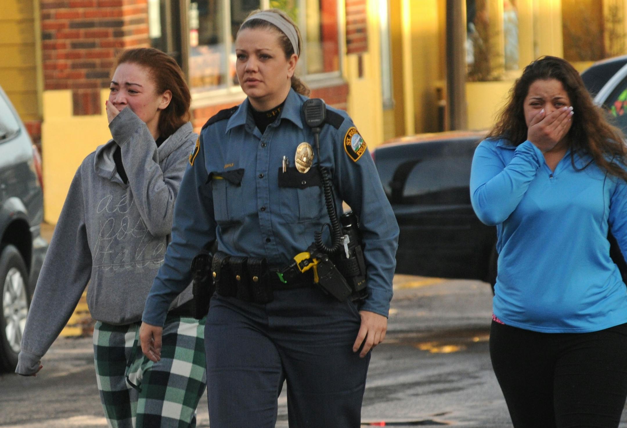 Family members were escorted from the scene of the fire, which was reported by a motorist shortly after
4 a.m. Tuesday.