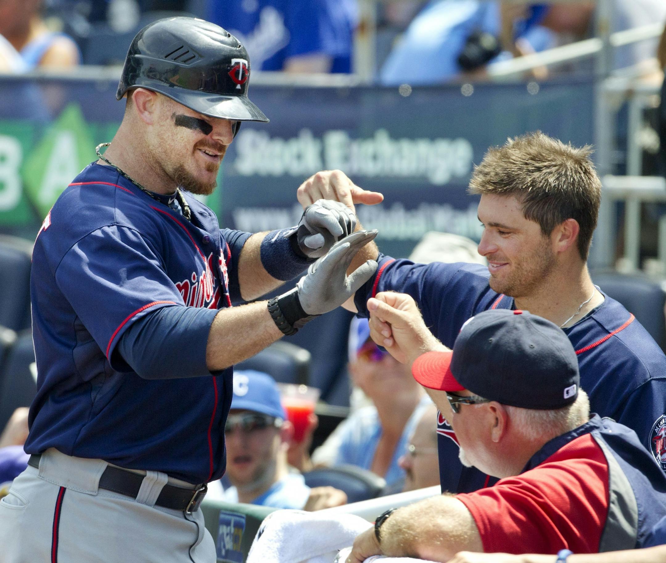 Ryan Doumit (left) opened the sixth inning with his ninth home run of the season, batting righthanded. He had homered leading off the second batting lefthanded and also had a two-run single in a four-run third to match his career high for RBI. He became the third Twins player to go deep from both sides of the plate in a game.