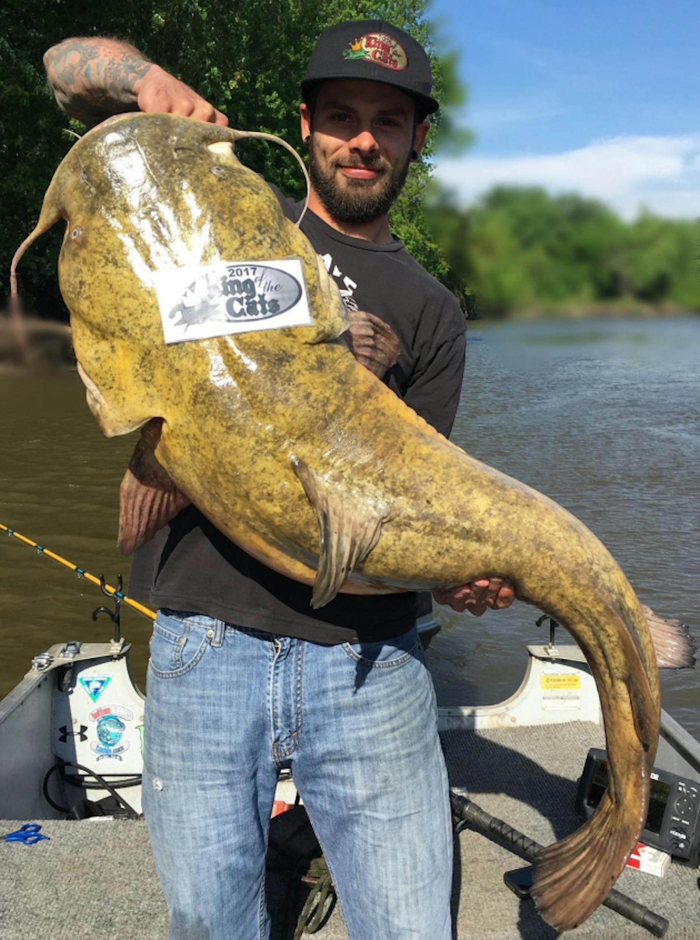 Jake Robinson of Shakopee with his record catch-and-release: a flathead catfish with a girth of 33 1/2 inches.