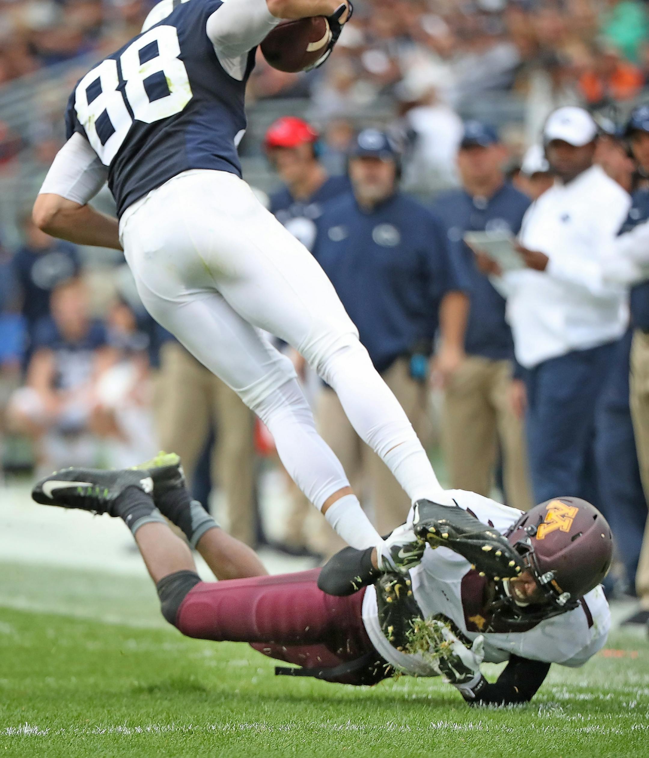 Minnesota's defensive back Damarius Travis tackled Penn State's tight end Mike Gesicki in the second quarter as Minnesota took on Penn State at Beaver Stadium, Saturday, October 1, 2016 in State College, PA.