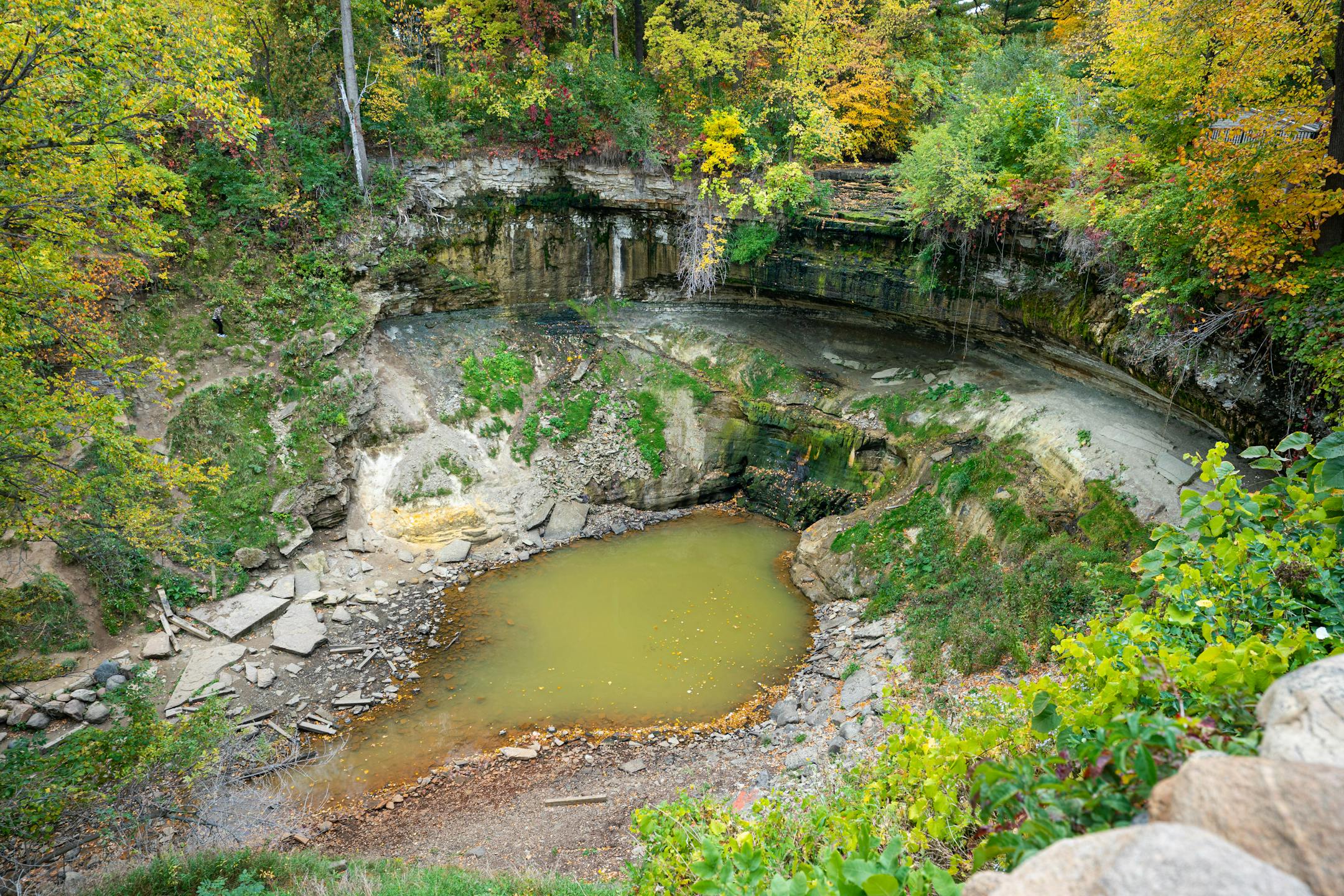 For the second year in a row Minnehaha Creek has dried up into stagnant pools that don't move and Minnehaha Falls has no water moving over the falls, seen on Friday, Oct. 7, 2022 in Minneapolis, Minn.