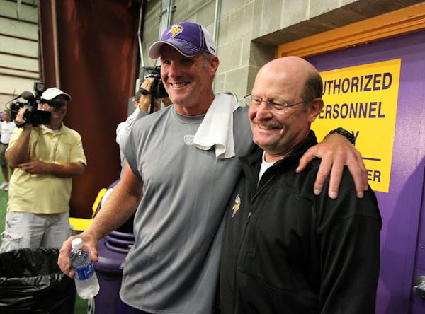 Brett Favre and Vikings coach Brad Childress were all smiles after Favre's first day of practice in 2010.
