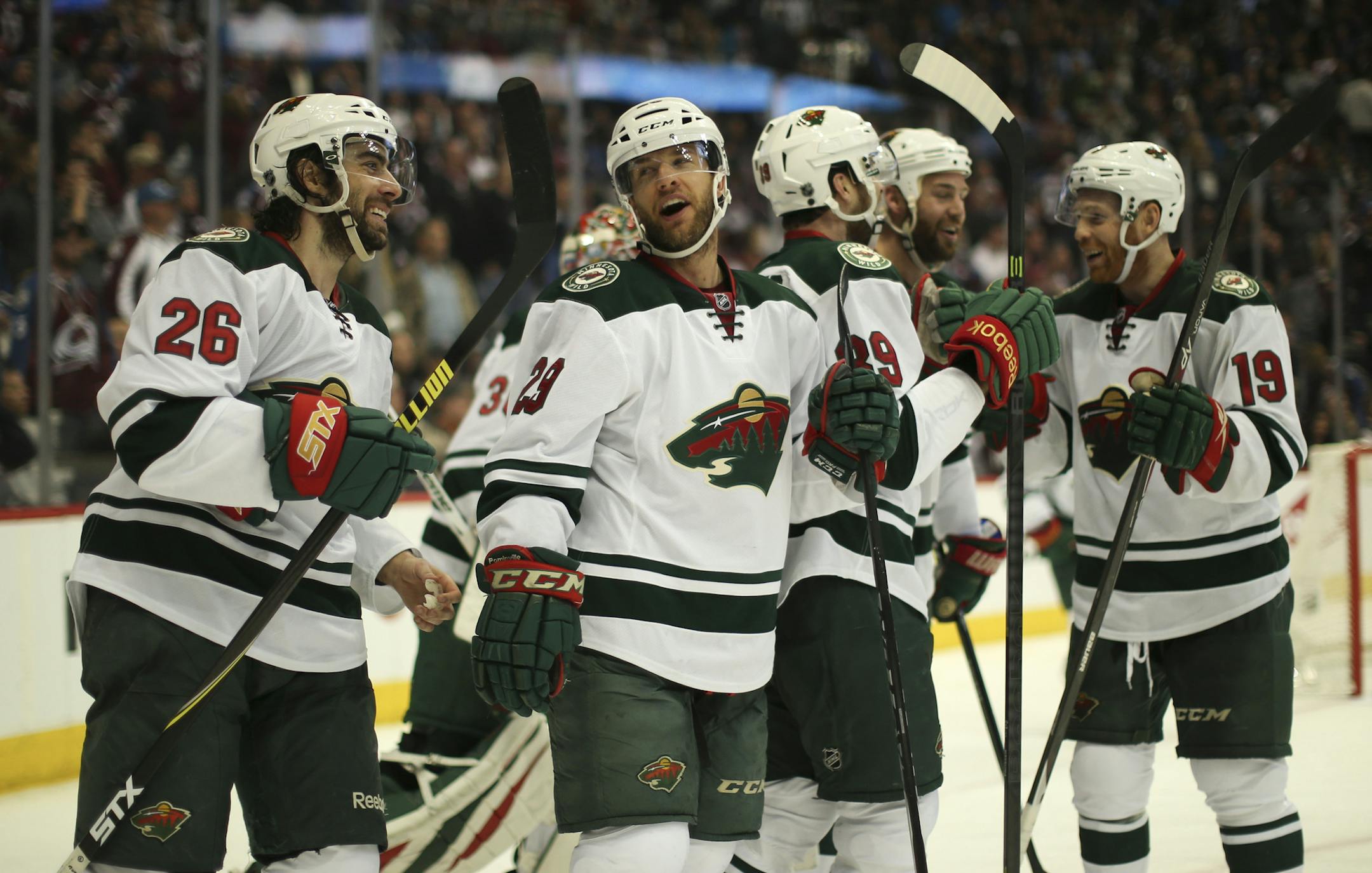Wild players Matt Moulson (26) and Jason Pominville (29) were among players celebrating after the overtime win Wednesday night at Pepsi Center in Denver. ] JEFF WHEELER ‚Ä¢ jeff.wheeler@startribune.com The Minnesota Wild beat the Colorado Avalanche 5-4 in overtim in game 7 of their NHL opening round playoff series Wednesday night, April 29, 2014, at Pepsi Center in Denver.