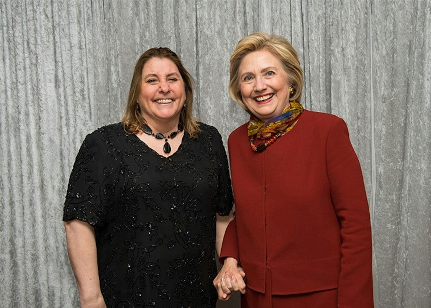 Edina jewelry maker Gail Be with Democratic presidential candidate Hillary Clinton during her campaign stop in Minneapolis in December. Clinton wore a necklace that Be had beaded for her.