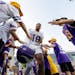 Minnesota Vikings receiver Justin Jefferson (18) runs out for evening practice Tuesday, August 8, 2023, at TCO Stadium in Eagan, Minn.