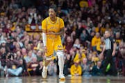 Gophers guard Elijah Hawkins celebrates hitting a three-pointer against Penn State in the second half Saturday at Williams Arena.