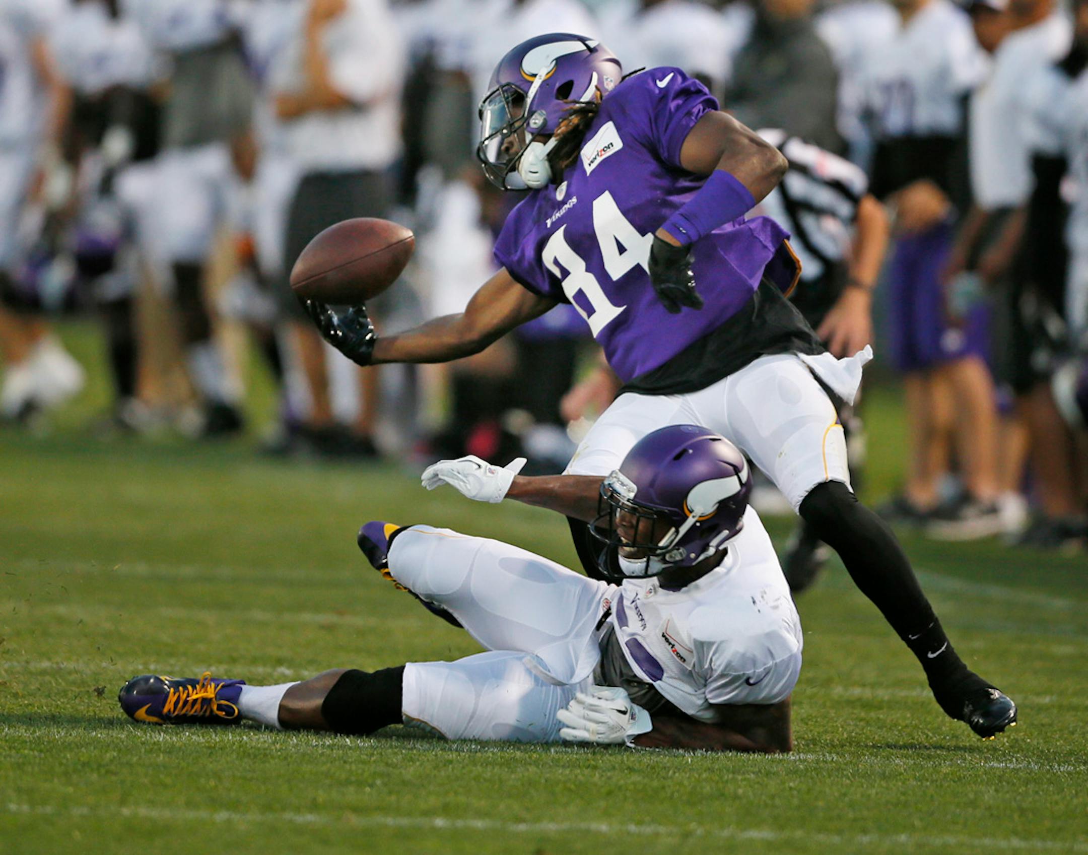 Cordarrelle Patterson (84) pulled a catch over Chris Cook during Vikings scrimmage at Minnesota State University Mankato Saturday Aug 3 ,2013.