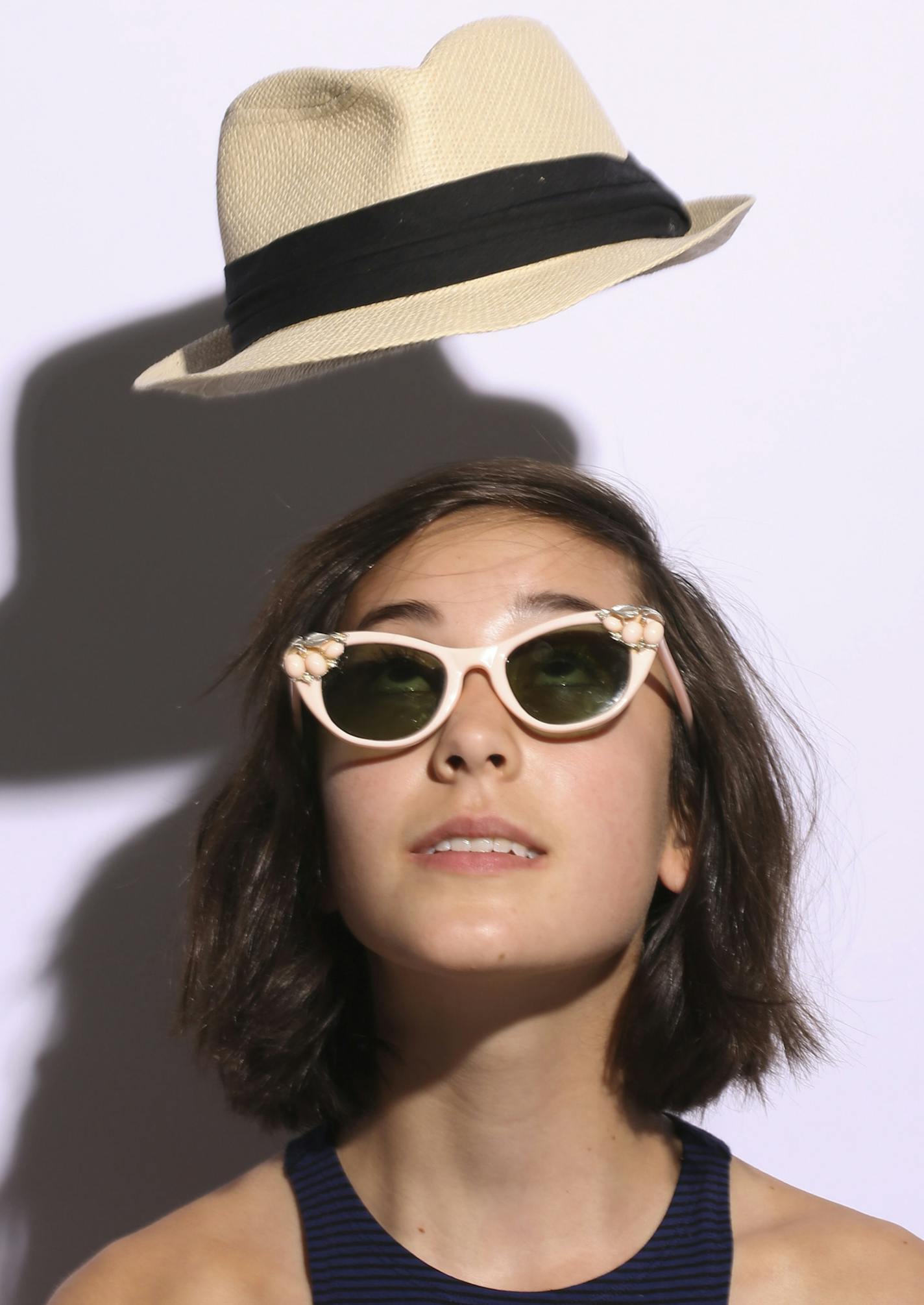 Vintage sunglasses and Target straw hat.