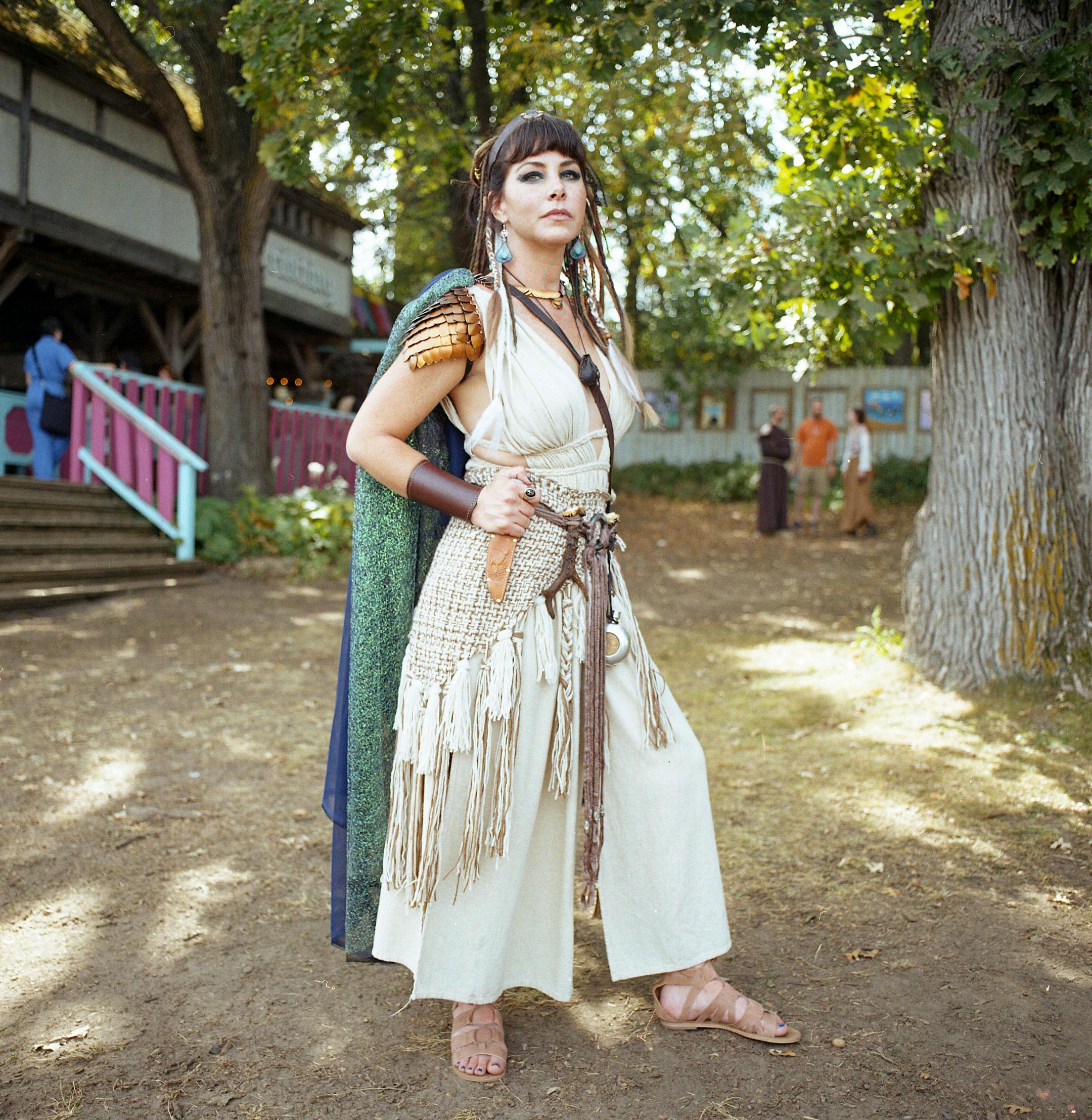 Caitlin Mueller poses for a portrait dressed as a viking. "I love that this brings the magic back to your life [...] you lose your imagination as an adult but this brings it back," Mueller said.