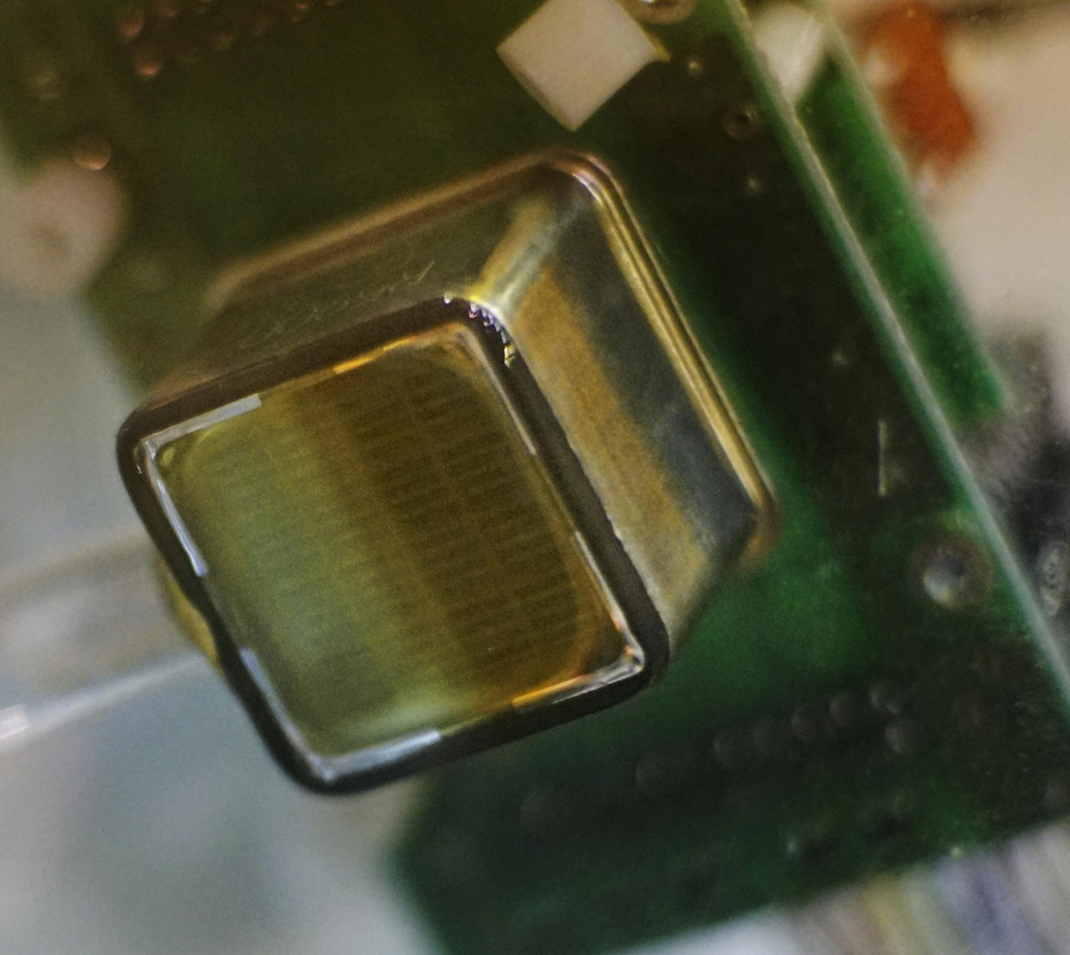 A highly sensitive photo detector is used to collect possible evidence of neutrinos.