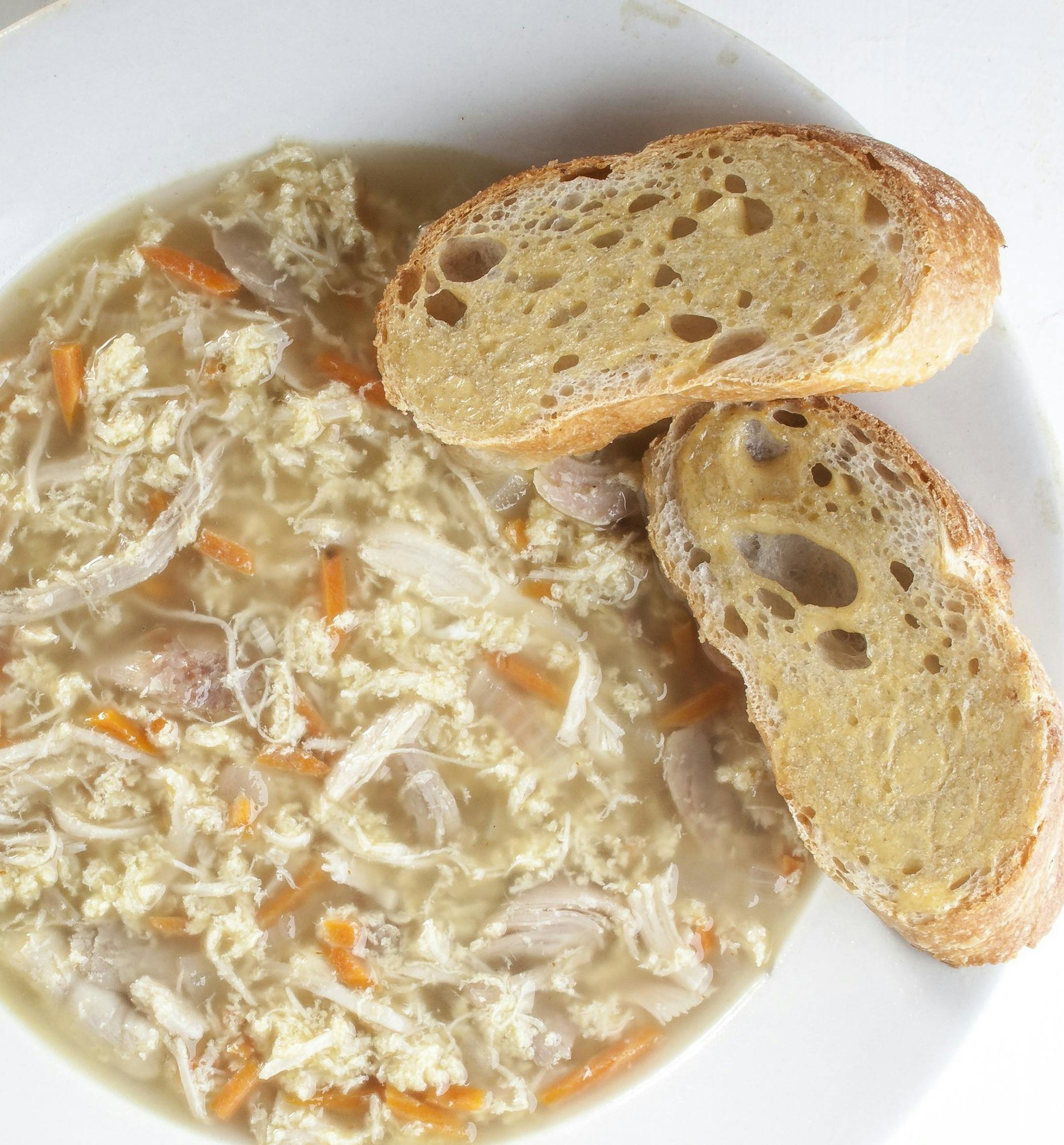 For many of us, the contents of our refrigerator, a few eggs, some leftover rotisserie chicken and bottled condiments, are not always inspiring. In the hands of culinary pros, though, they become intriguing dishes, ranging from soups to pastas. Here, Spicy stracciatella. (Bill Hogan/Chicago Tribune/MCT) ORG XMIT: 1144777