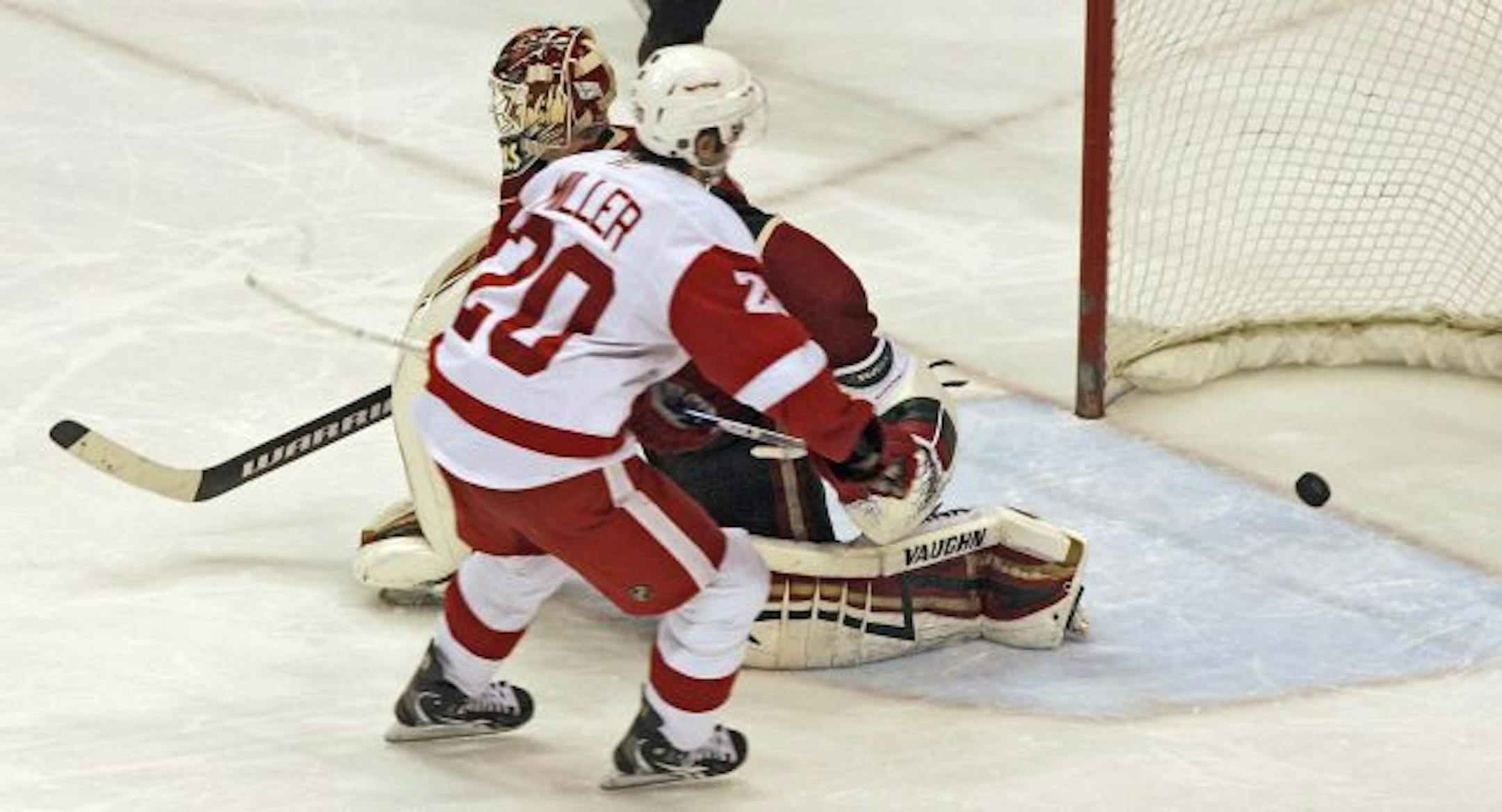 ] Detroit's Drew Miller beat Wild goalie Niklas Backstrom for the final shootout goal giving the Red Wings a 4-3 victory.