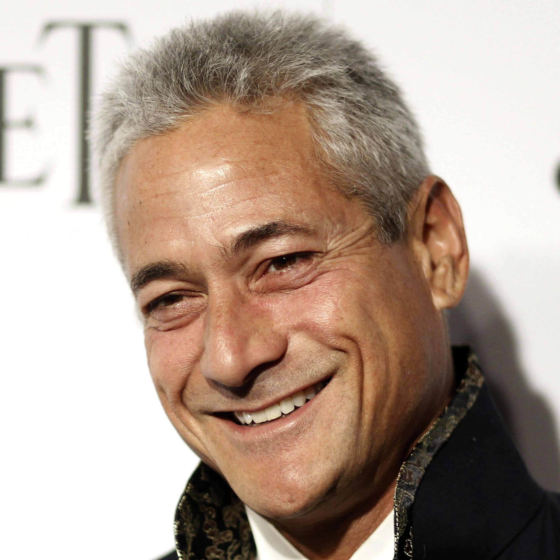 FILE - In this Oct. 27, 2011 file photo, former Olympic diving champion Greg Louganis arrives at amfAR's Inspiration Gala in Los Angeles. Louganis plans to get married this fall. People magazine says the 53-year-old Louganis will marry paralegal Johnny Chaillot. (AP Photo/Matt Sayles, File)