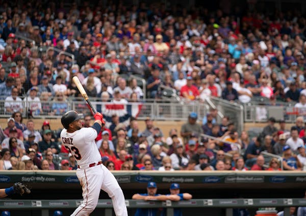 The Twins' Nelson Cruz followed through on his 40th home run of the season, and his 400th career homer, a 412 foot solo shot to right field in the fou