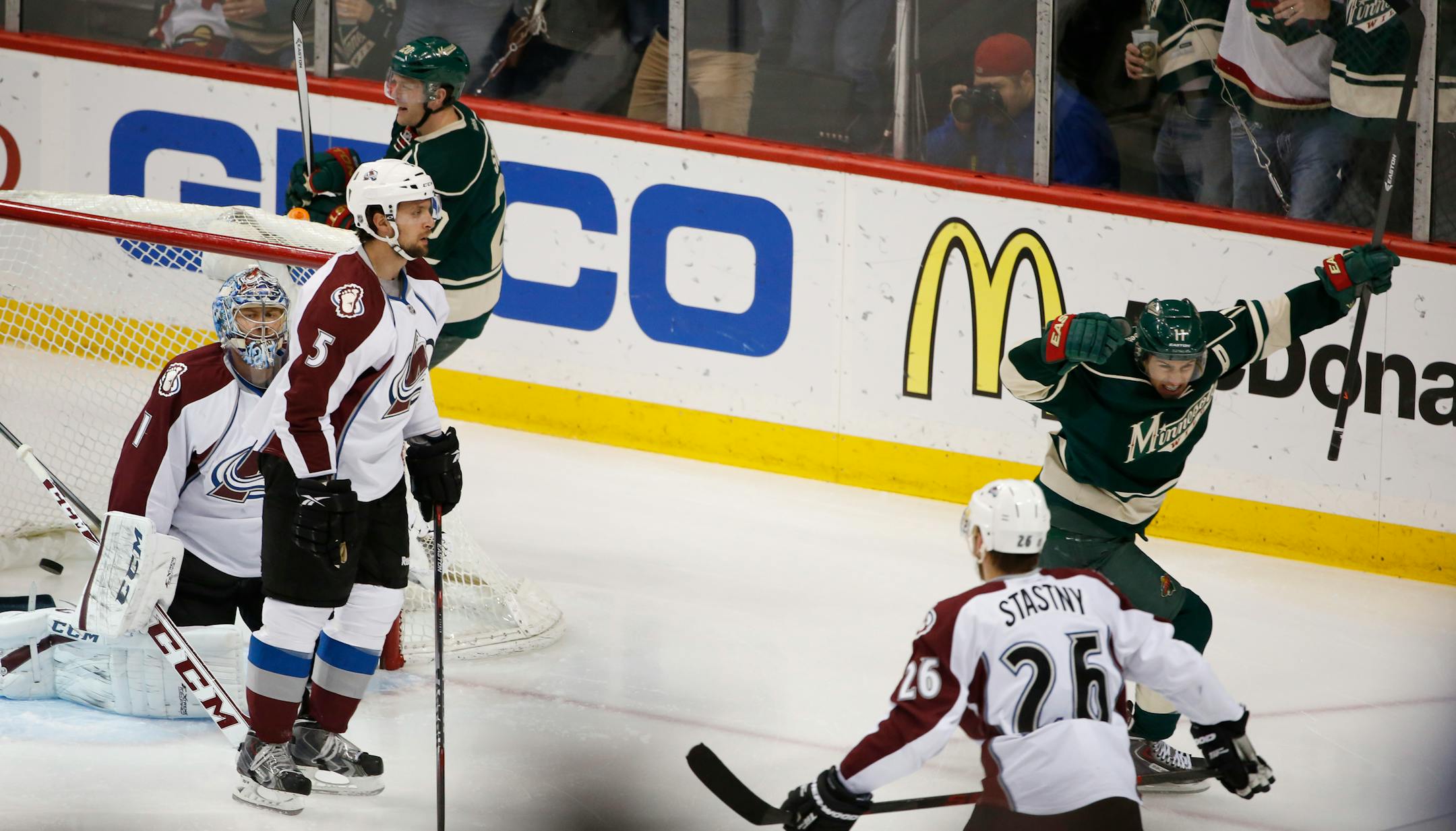 Minnesota's Zach Parise (11) celebrated his first-period goal Monday night against Colorado.