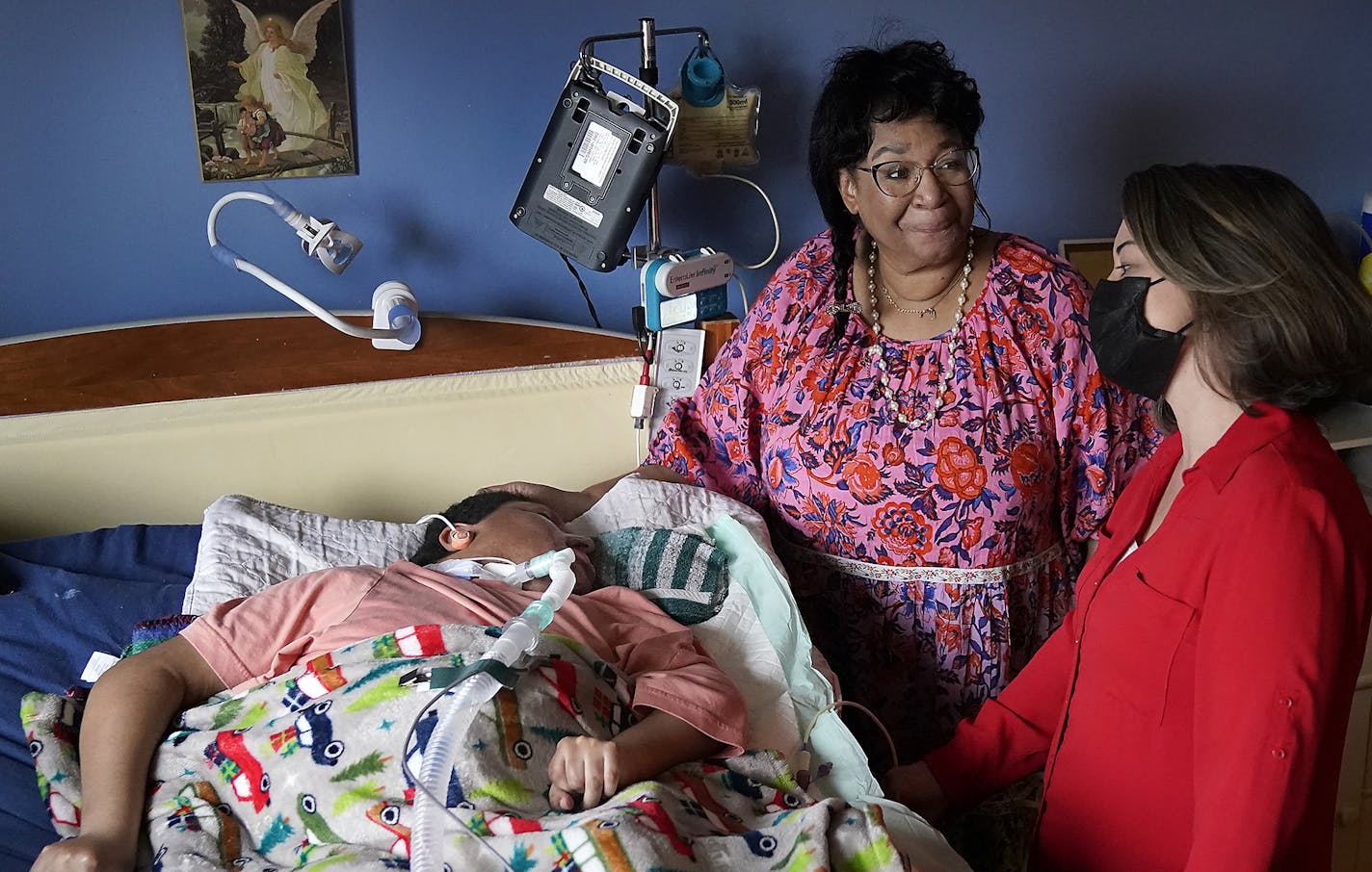 U.S. Rep Angie Craig, right, met with members of the Harris family, whose 28-year-old son Josh wasn't able to receive any stimulus checks from earlier bills prior to the rescue plan during the pandemic.