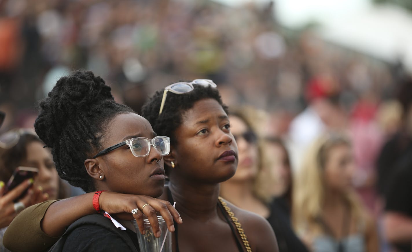 Adriana Foreman, left, and Junauda Petrus lisfened to The Roots on the Main Stage Sunday evening at Soundset 2016. ] JEFF WHEELER &#xef; jeff.wheeler@startribune.com The ninth annual Soundset hip-hop festival took place in its new location at the Minnesota State Fairgrounds Sunday, May 29, 2016 in Falcon Heights.