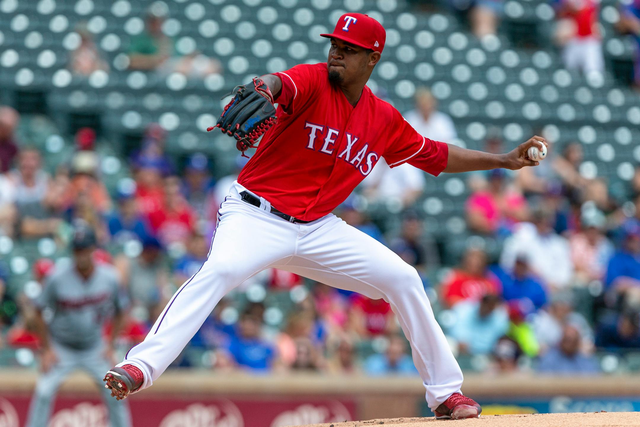 Texas Rangers starting pitcher Yohander Mendez delivers during the first inning of a baseball game against the Minnesota Twins, Sunday, Sept. 2, 2018, in Arlington, Texas. (AP Photo/Sam Hodde)