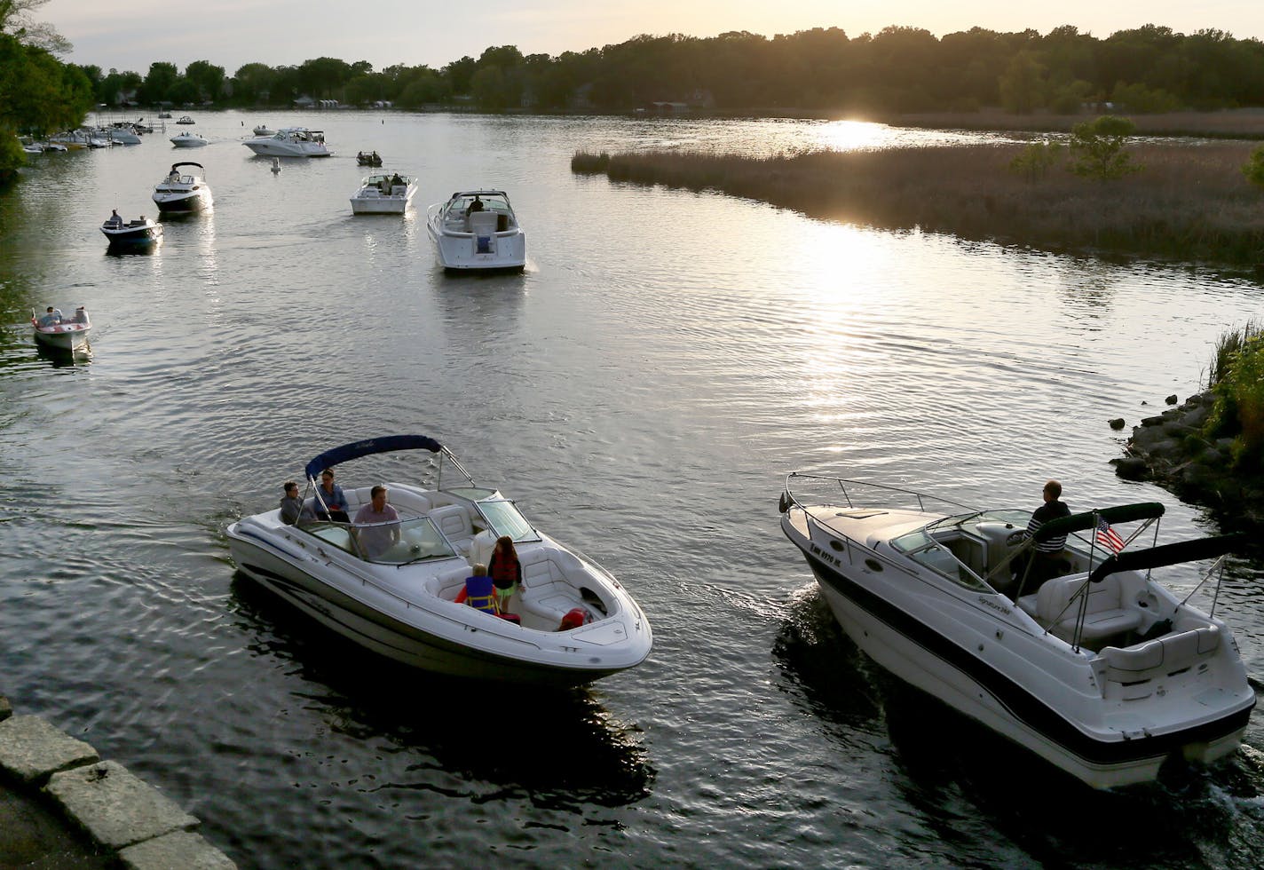 Boat traffic was heavy on Lake Minnetonka as daylight faded Friday, May 22, 2015, near Lord Fletcher's in Spring Park, MN.](DAVID JOLES/STARTRIBUNE)djoles@startribune.com As boaters flock to Minnesota lakes and rivers this holiday weekend for the unofficial kick-off to the boating season, they'll face more inspections in and out of the water as local cities and counties ramp up their work to stop the spread of invasive species. Across the metro, more boat accesses will be staffed by watercraft i