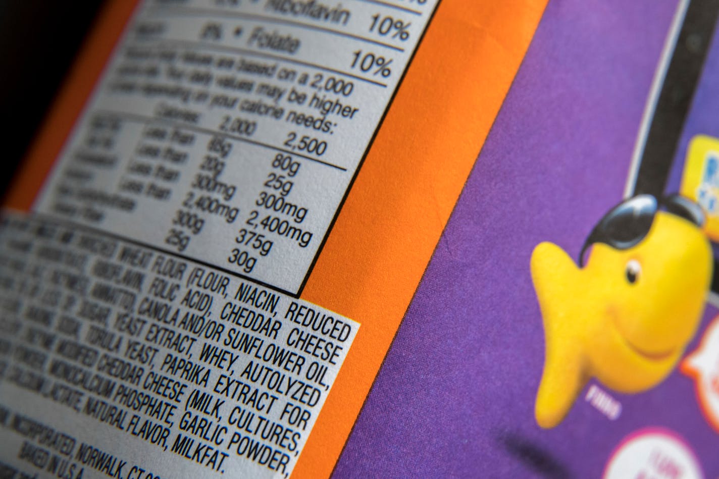 Whey is one of ingredients listed on a bag of Pepperidge Farm Goldfish Flavor Blasted Xtra Cheddar crackers, Tuesday, July 24, 2018 in New York. Flavor Blasted Xtra Cheddar is one of four varieties of Goldfish Crackers Pepperidge Farm is voluntarily recalling because of fears they could potentially have salmonella. The company on Monday took the action after one of its ingredient suppliers notified it that whey powder used in a seasoning may be contaminated.