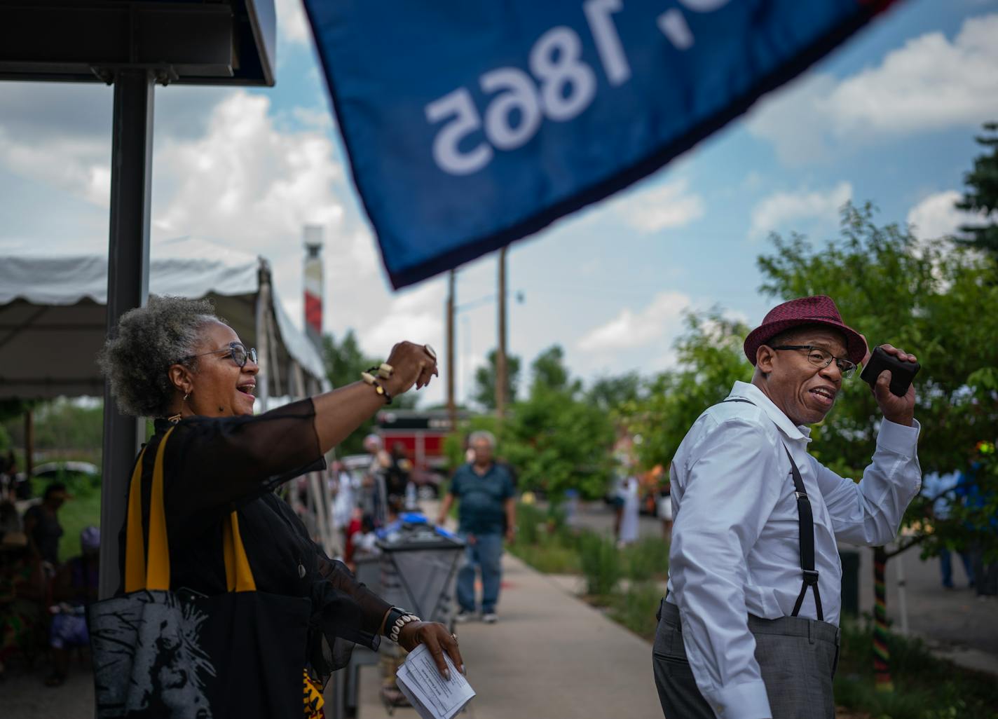 Patricia Lacy, left and Braxton Haulcy danced to the music at the Juneteenth event hosted by the Rondo Center of Diverse Expressions. Monday June 19,2023 in St. Paul,Minn.]   JERRY HOLT • jerry.holt@startribune.com