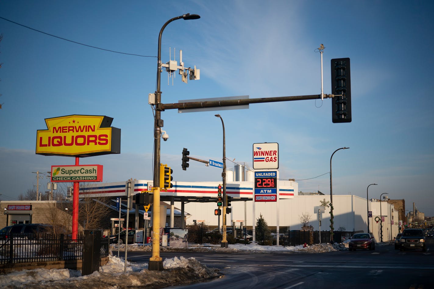 The Winner Gas station on the corner of W. Broadway and Lyndale Ave. N., with Merwin Liquors in the foreground across Lyndale Ave. N. ] JEFF WHEELER • jeff.wheeler@startribune.com