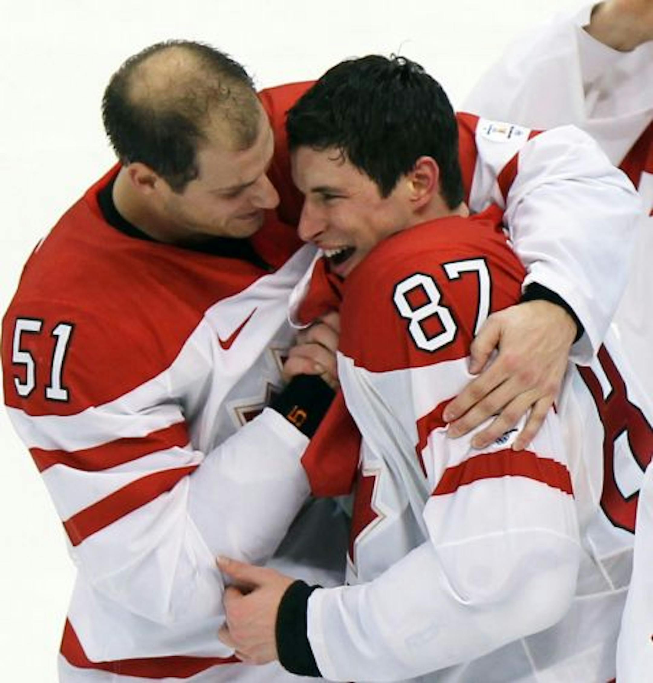 Canada's Sidney Crosby celebrated with teammate Ryan Getzlaf after scoring in overtime to beat the United States 3-2 for the gold medal on Sunday. "I've dreamed of this moment," Crosby said.