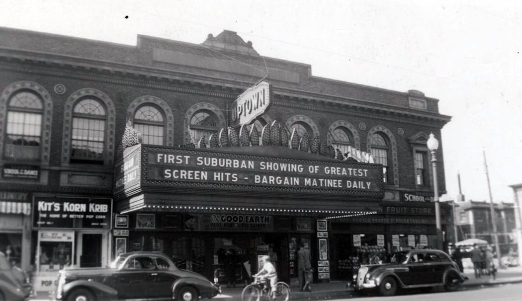 The Uptown area as it appeared in about 1940, after a redesign of the Uptown Theatre added the prominent mast to the building.